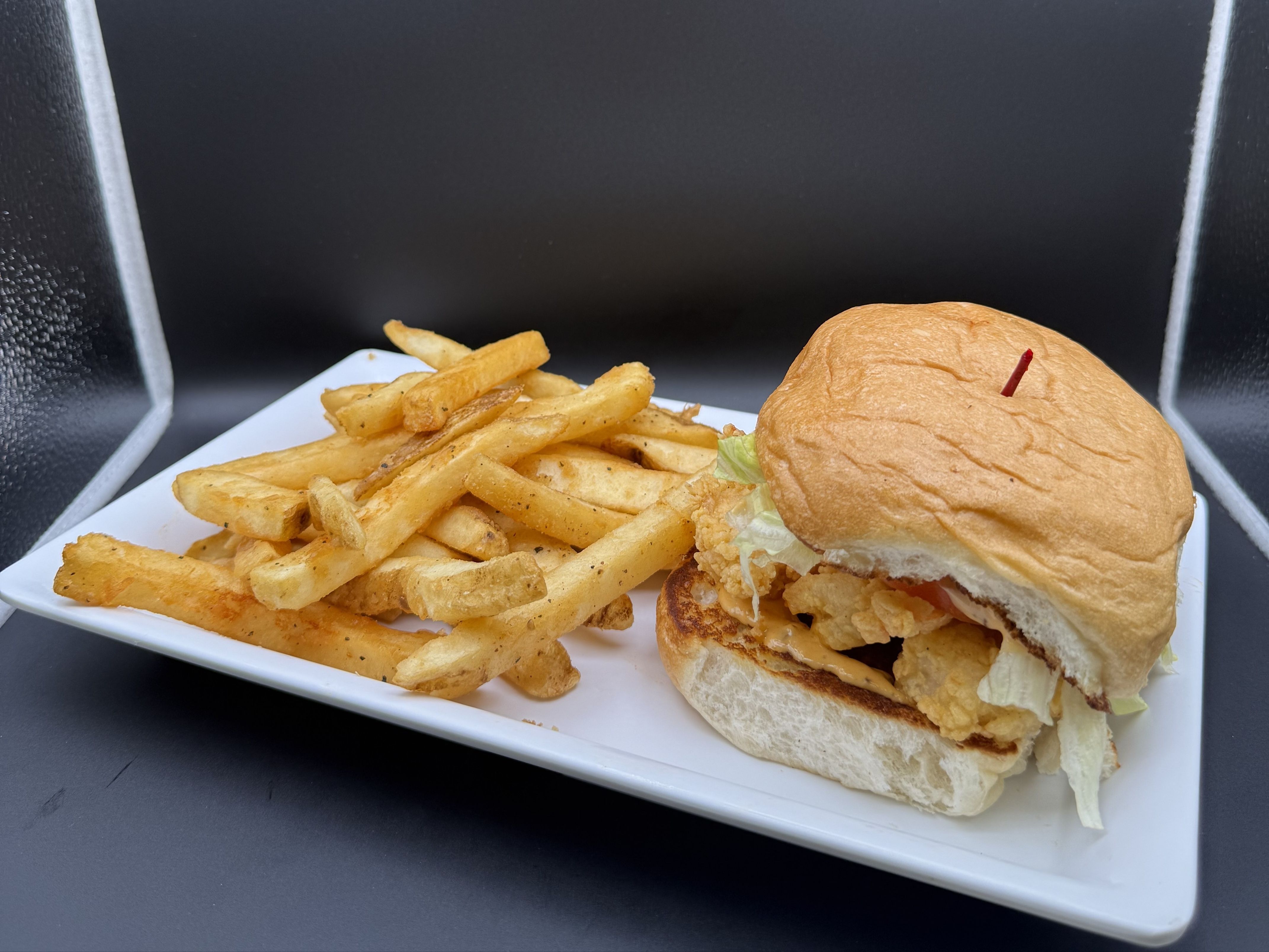 Shrimp Burger With Cajun Fries.