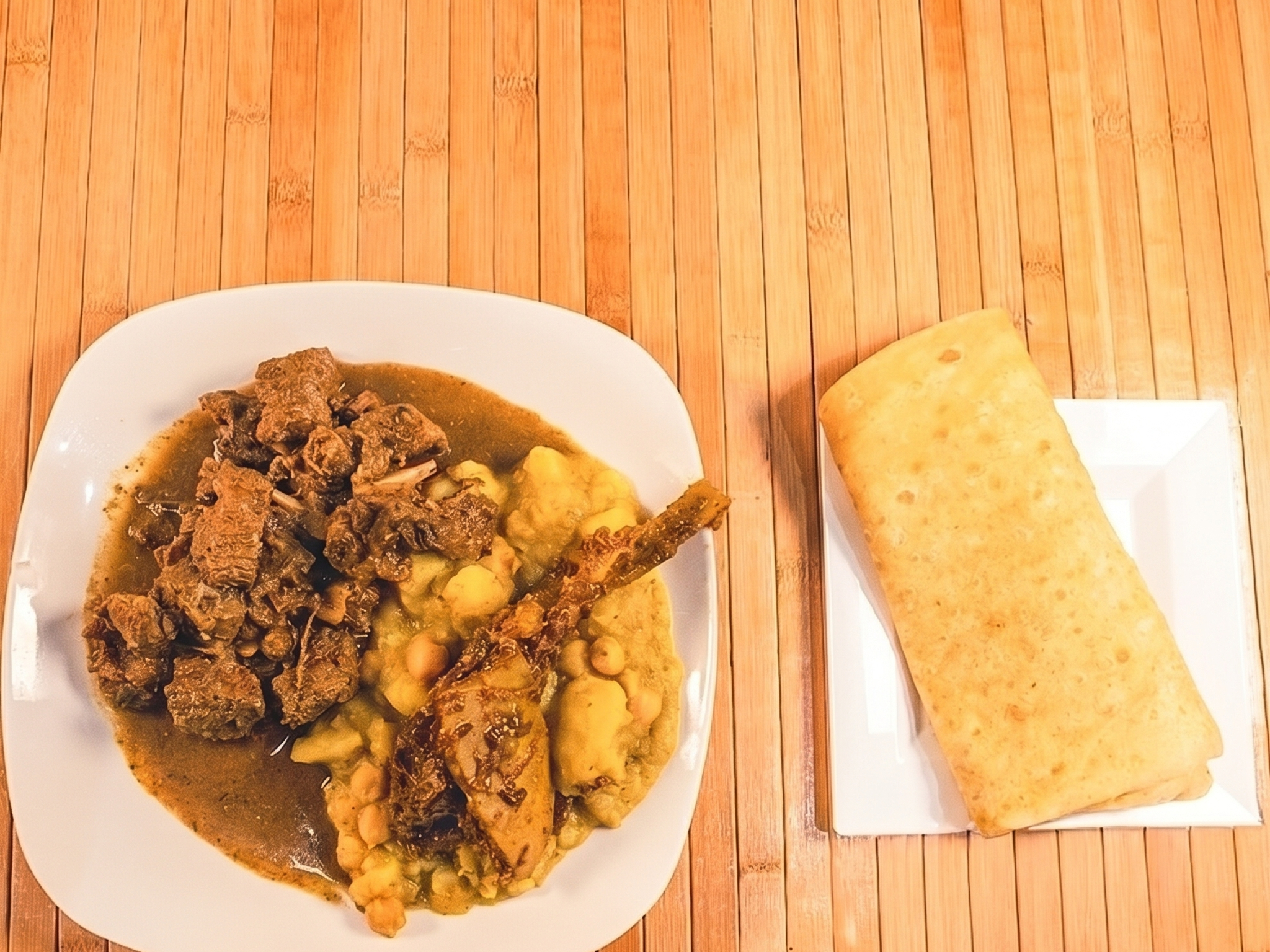 Curry Goat Roti Platter.