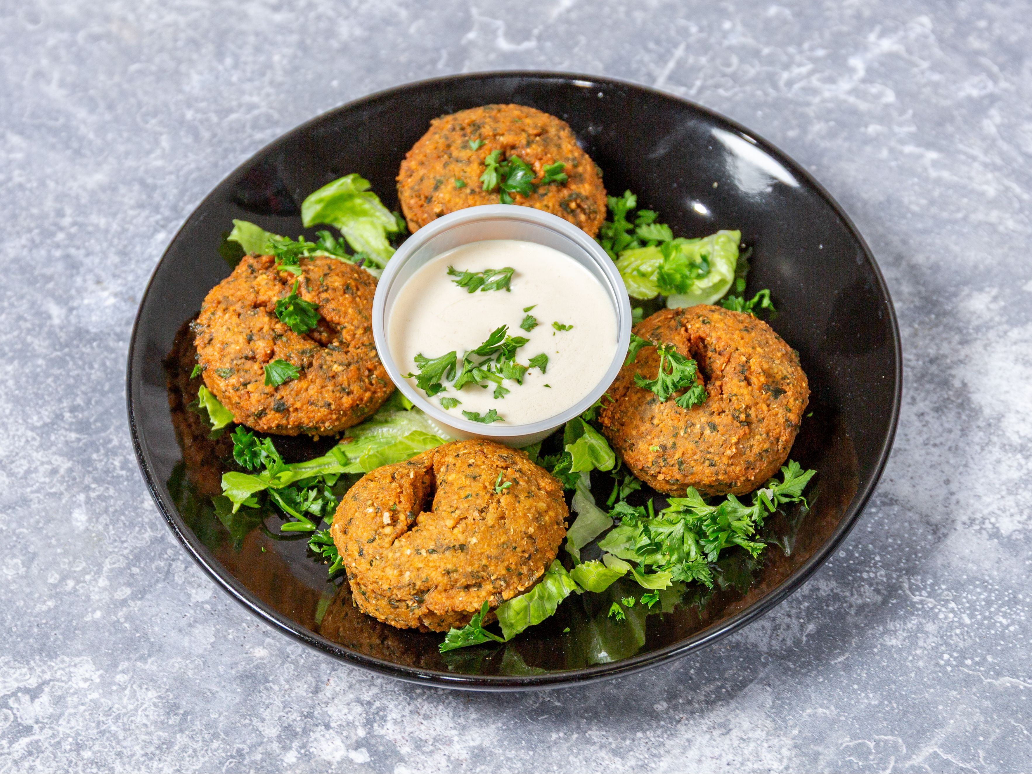 Falafel rounds W/ Tahini.