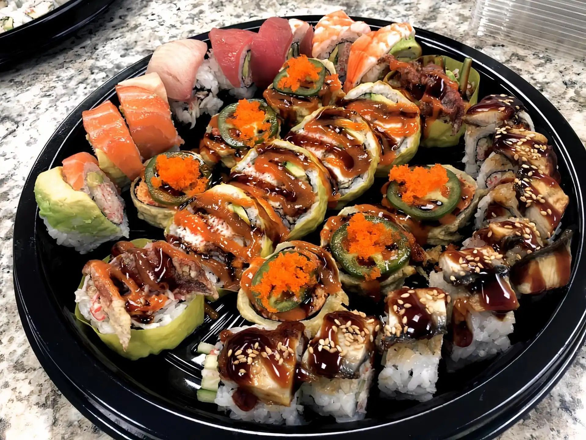 P3 (1 Rainbow Roll, 1 Volcano Roll, 1 Dragon Roll, 1 Shamrock Roll).