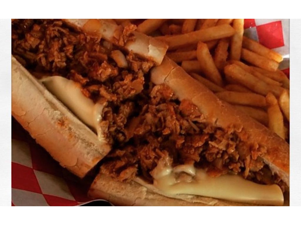 Buffalo Chicken Cheesesteak with Onions.