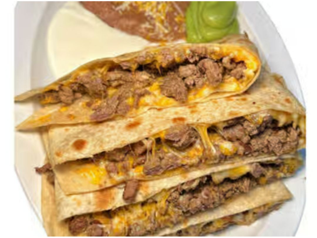 Carnitas  Super Quesadilla.