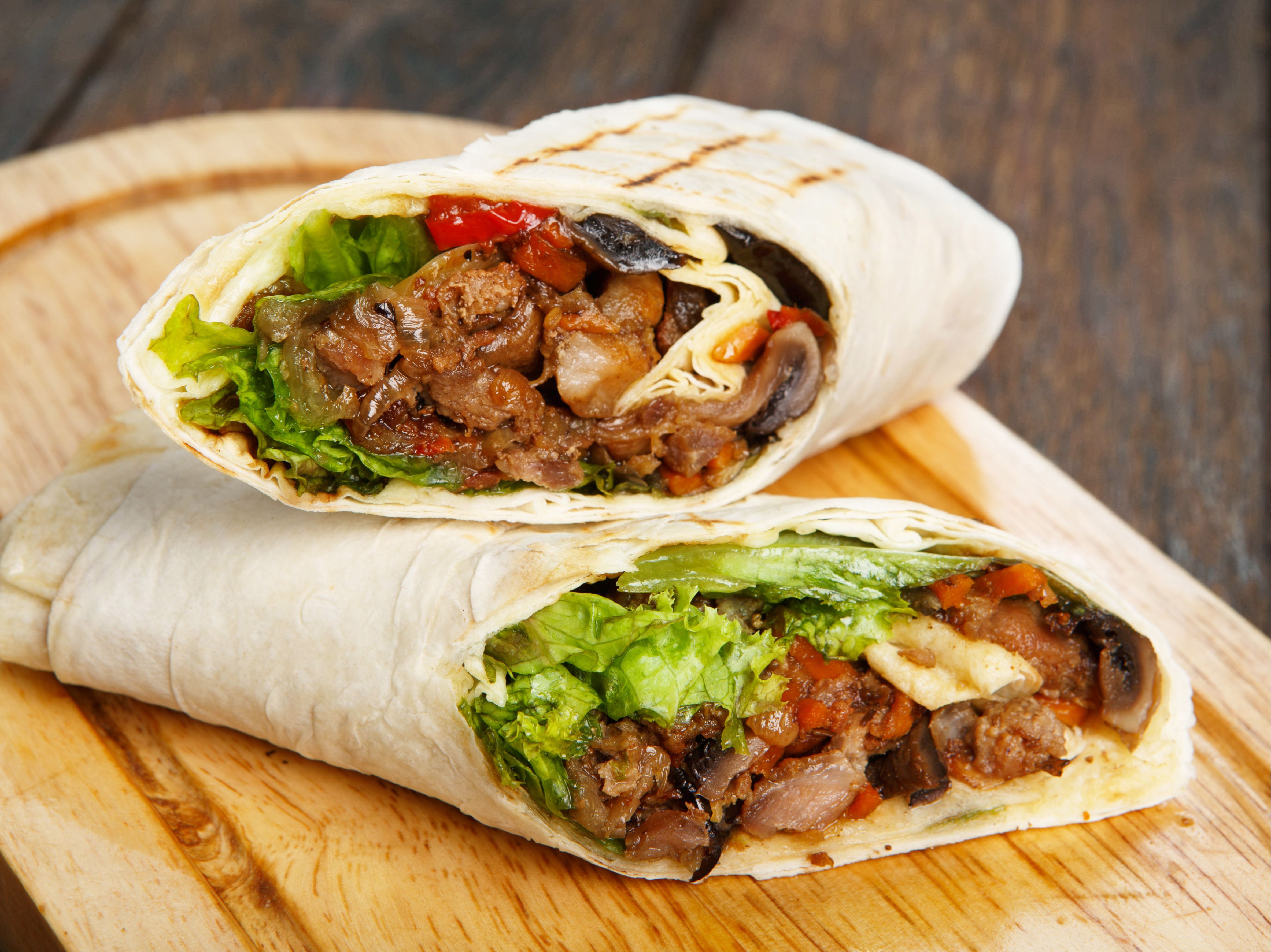 Chicharron Burrito Hand Held.