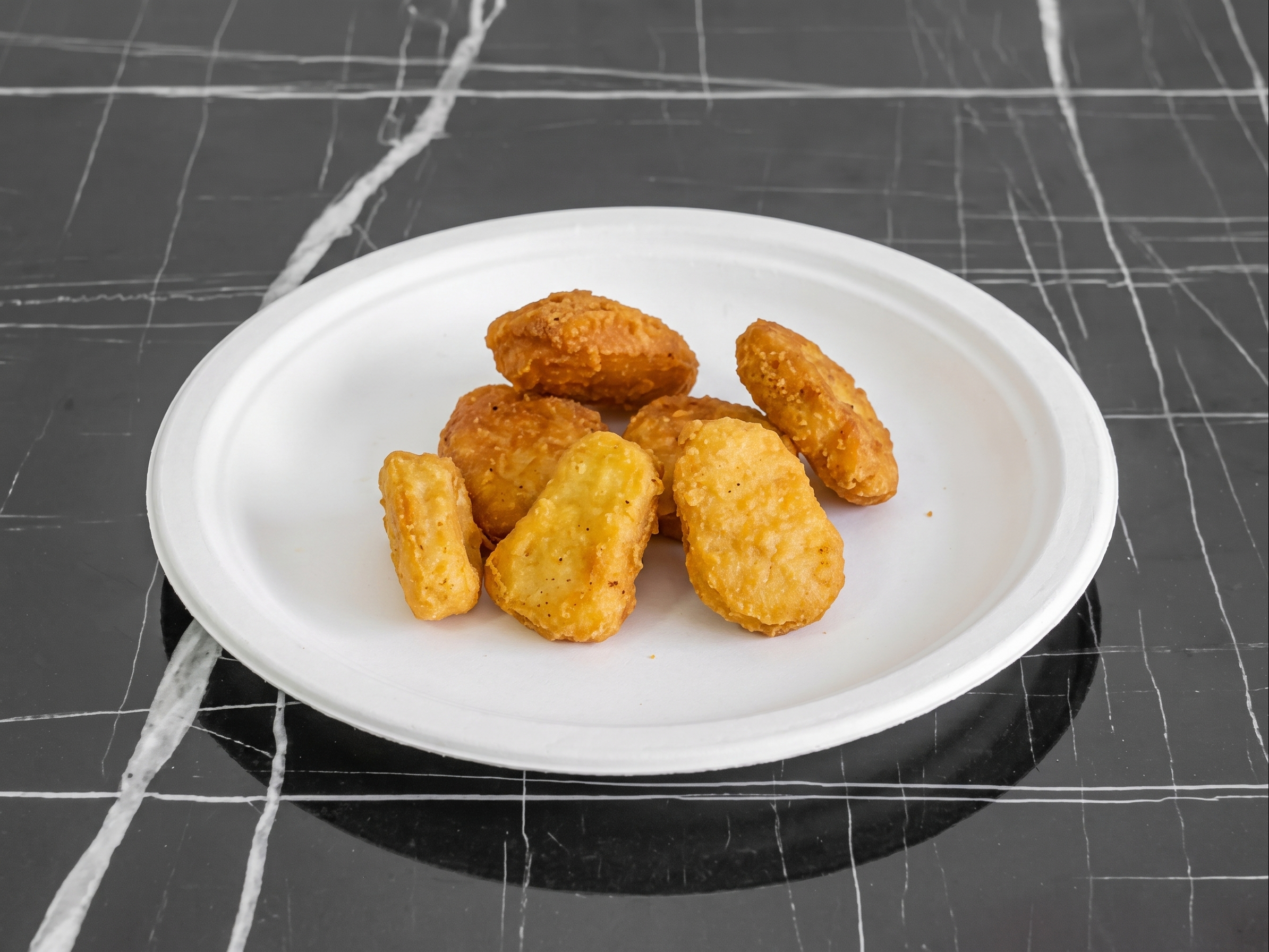 8 Pieces Chicken Nuggets.