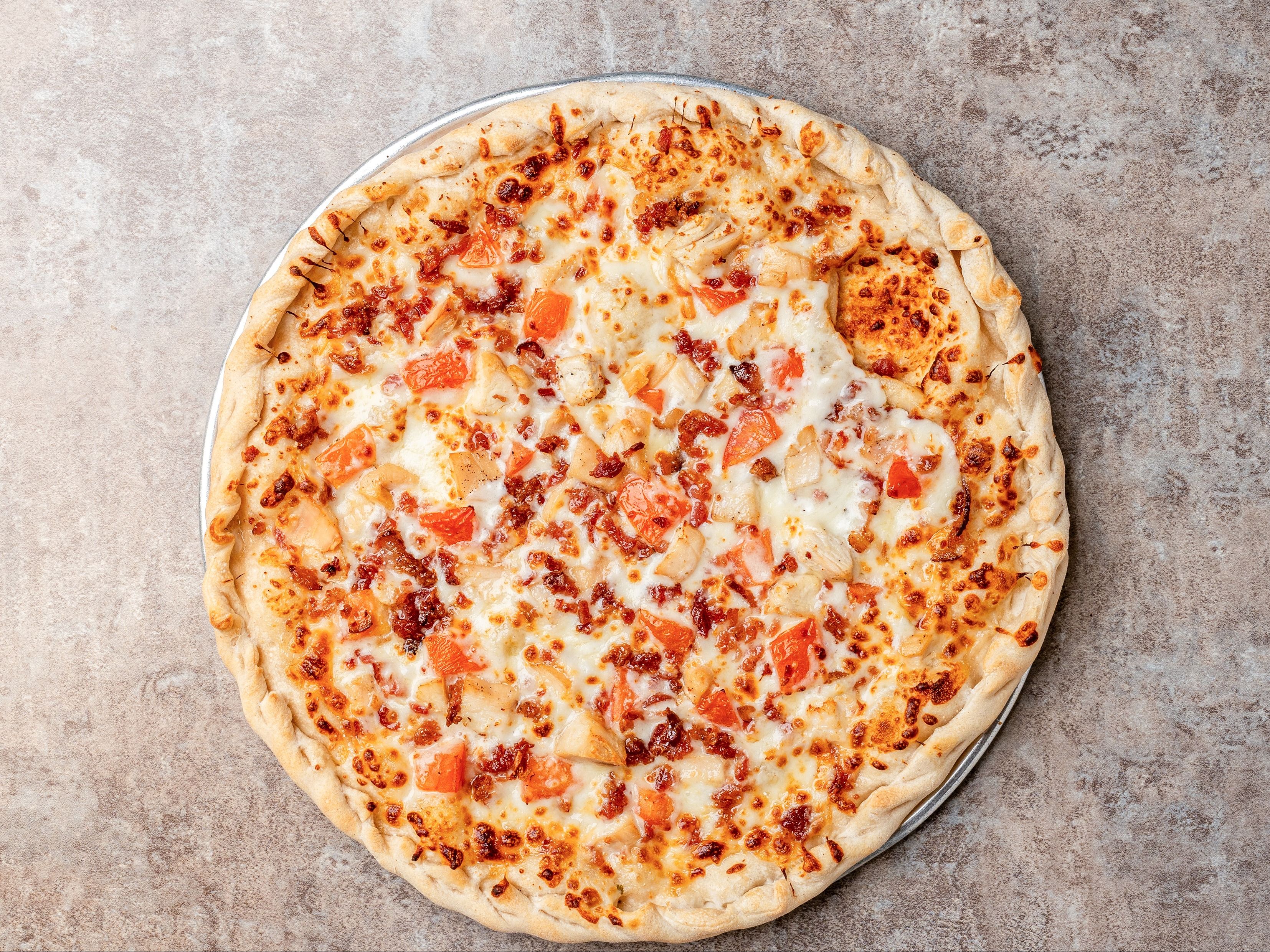 Medium Chicken Bacon Ranch w/Tomato Pizza.