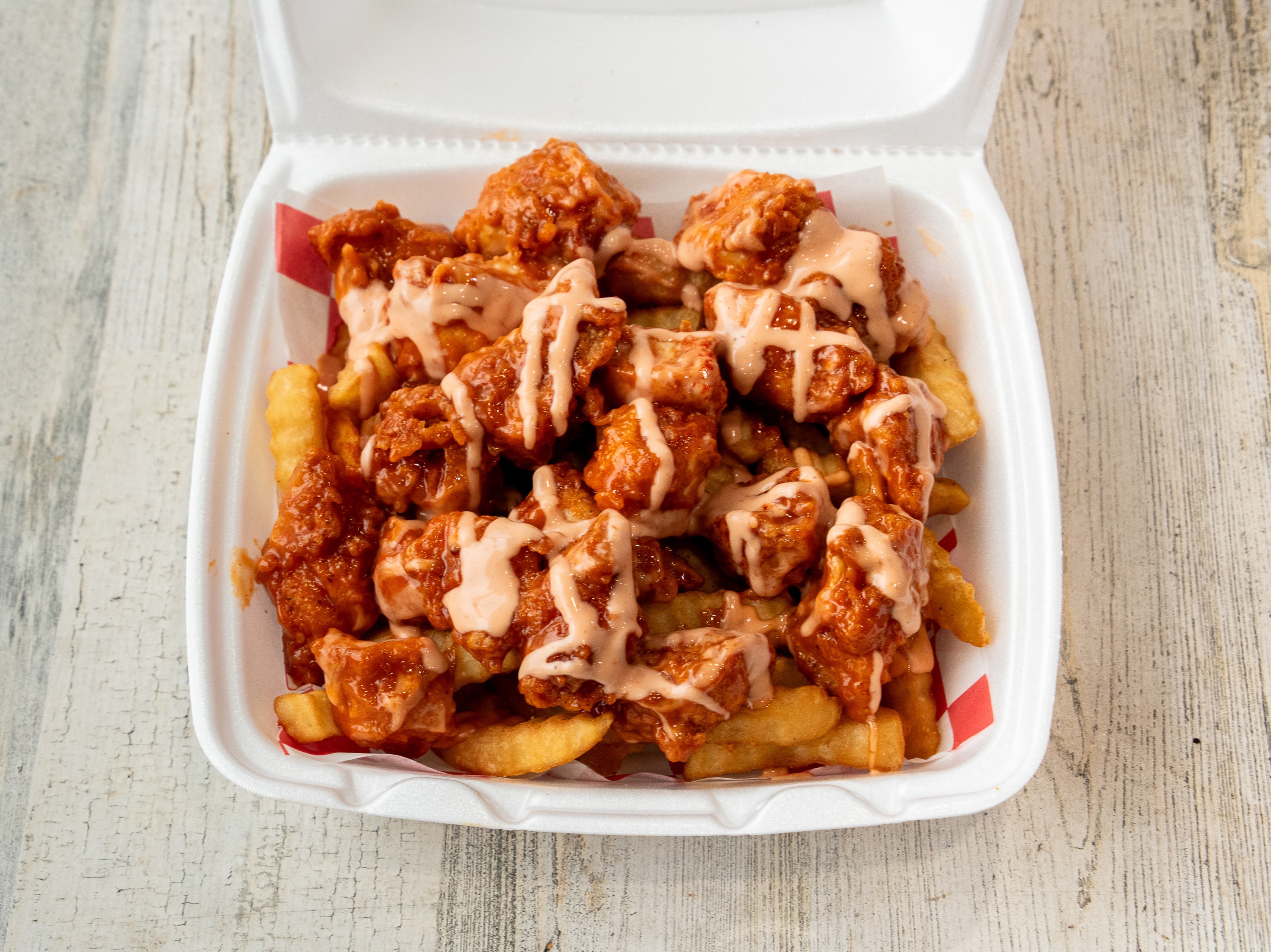 #13. Birdz Saucy Bites with fries