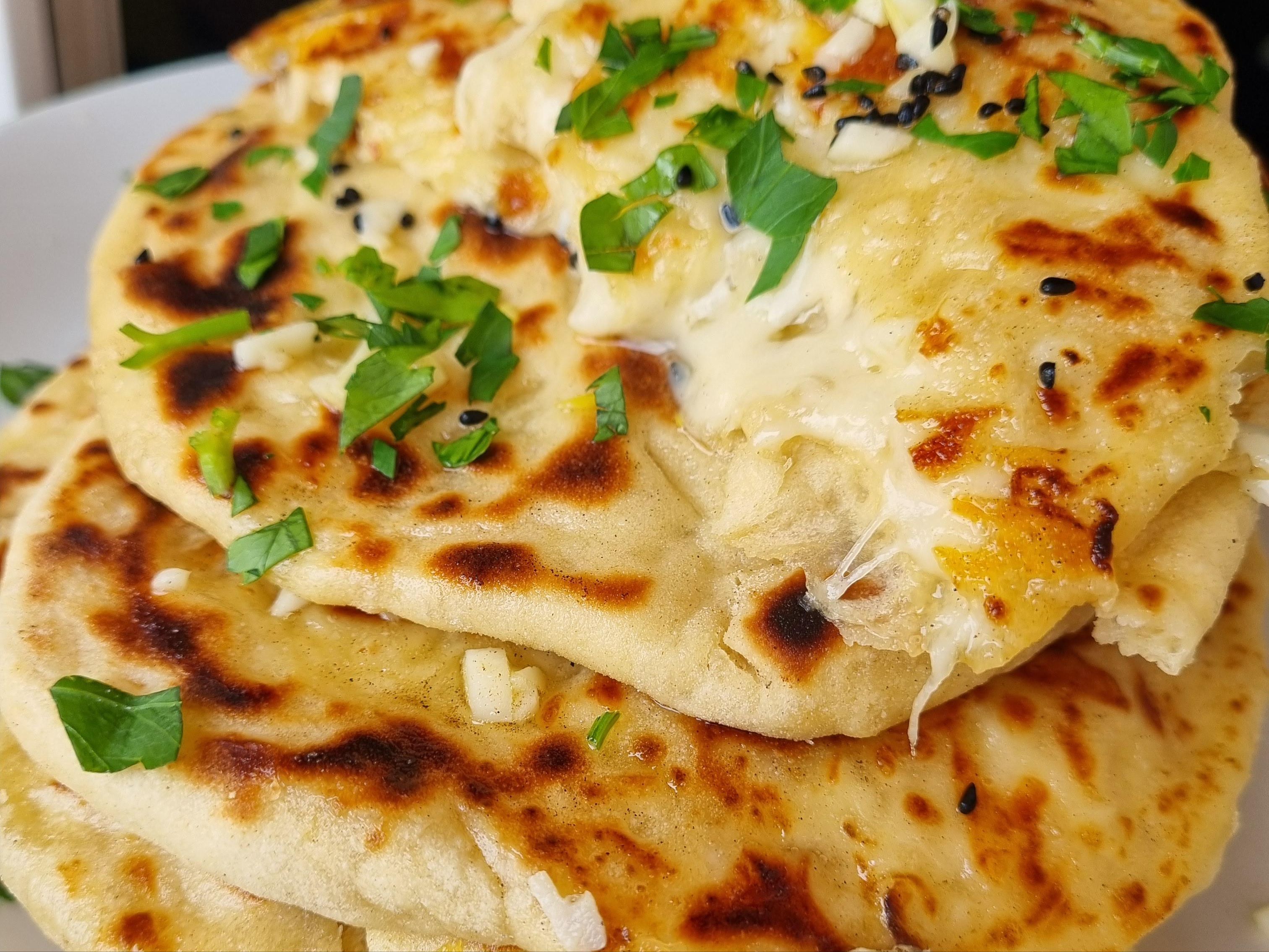 CHEESE GARLIC NAAN.