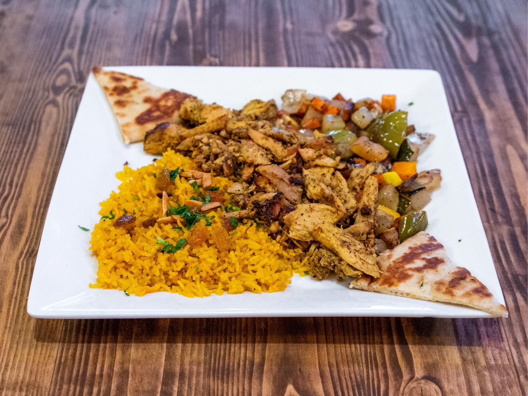 Chicken Shawarma With Choice Of Your 2 Sides.