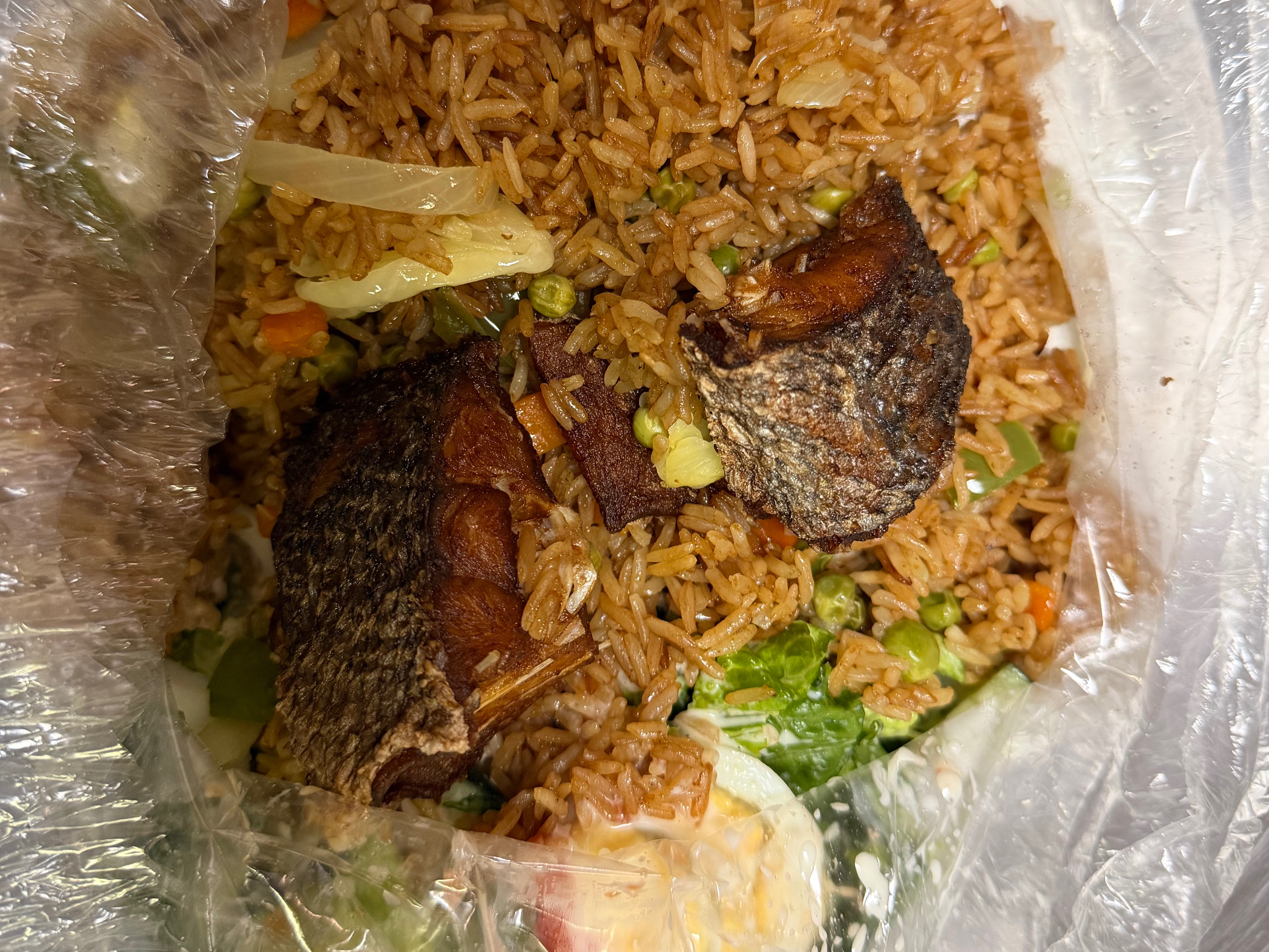 Check Check fried rice w  Fish.