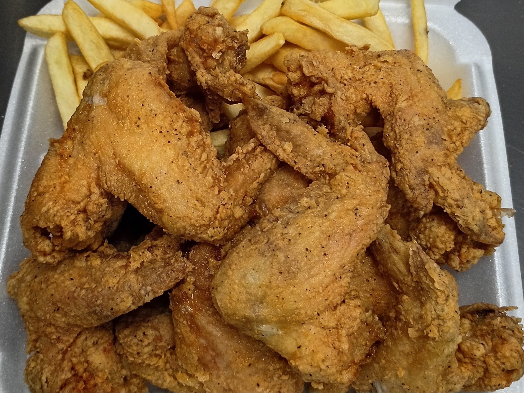 20 Whole Wings + Fries + Can Soda