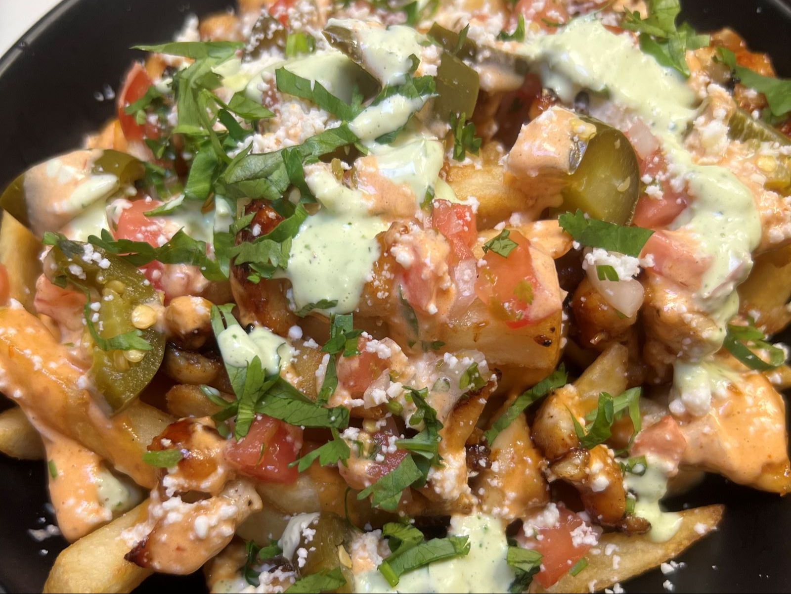 Jerk Chicken Street Fries.