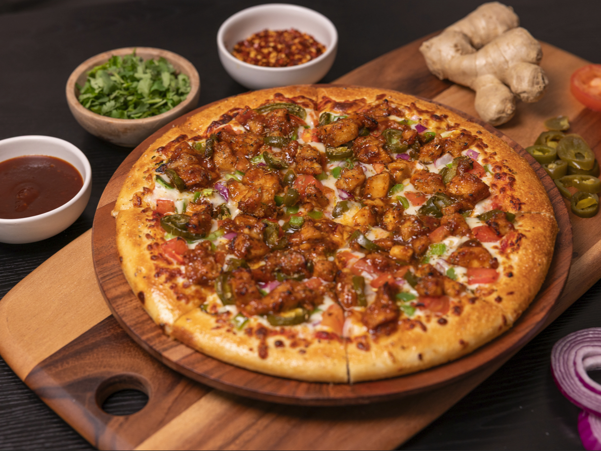 Halal Korean Chili Chicken Pizza.