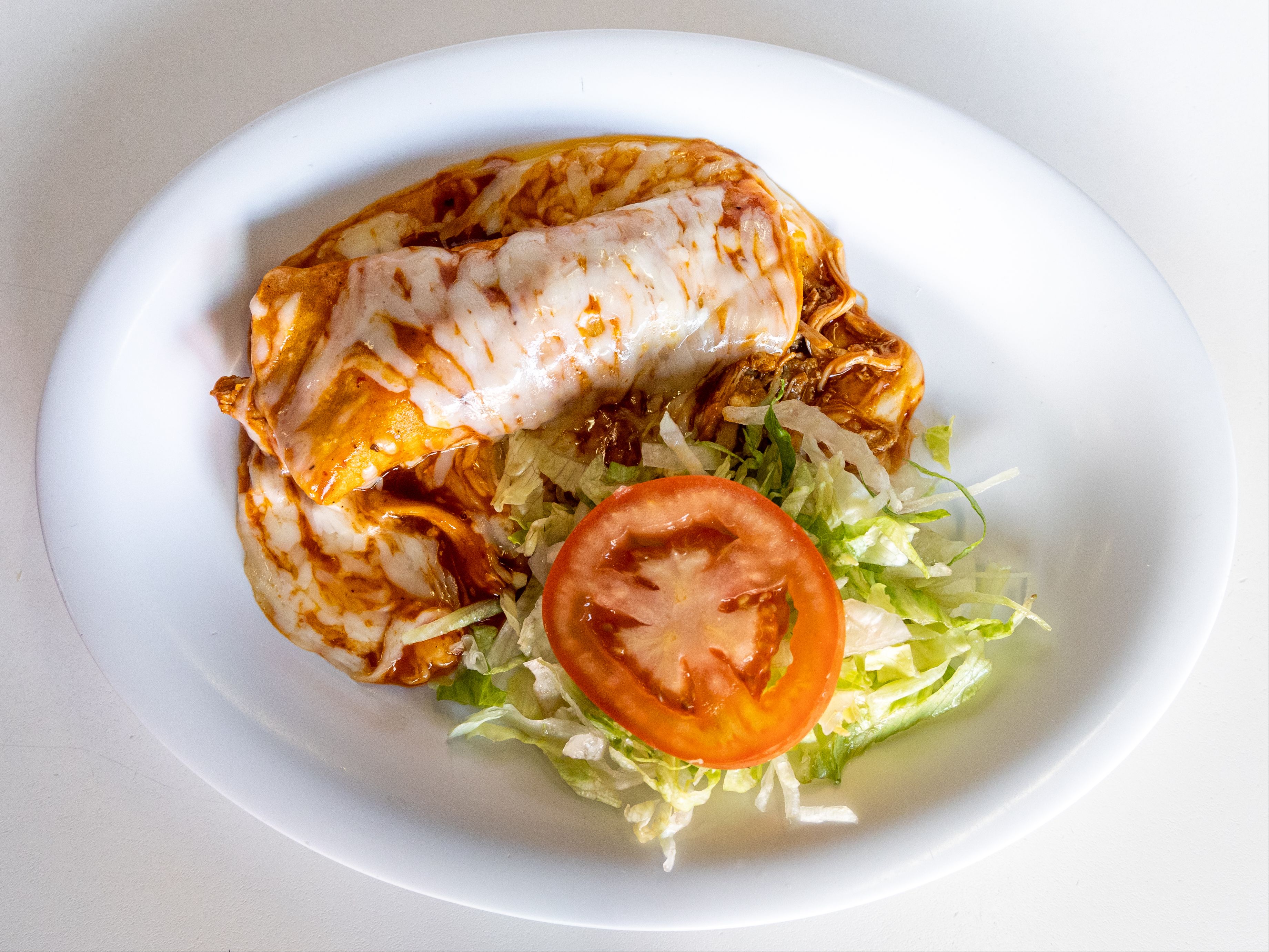 Enchilada a la Carta Con Carne.