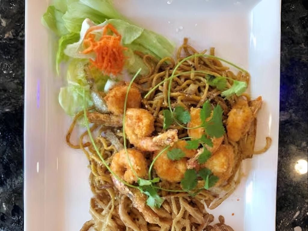 M91. Grilled Shrimp over Garlic Noodles.