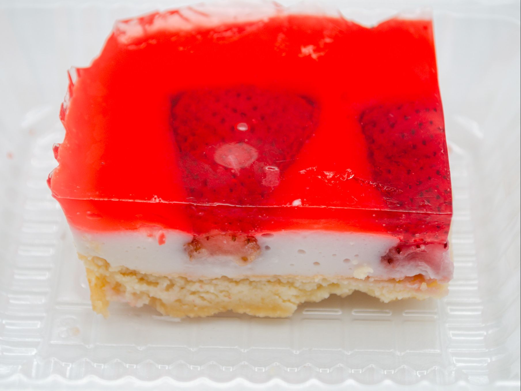 Strawberry Sensation Jello Haupia from Yama's Fish Market — Layers of strawberry Jell-O and haupia — light, colorful, and ono.