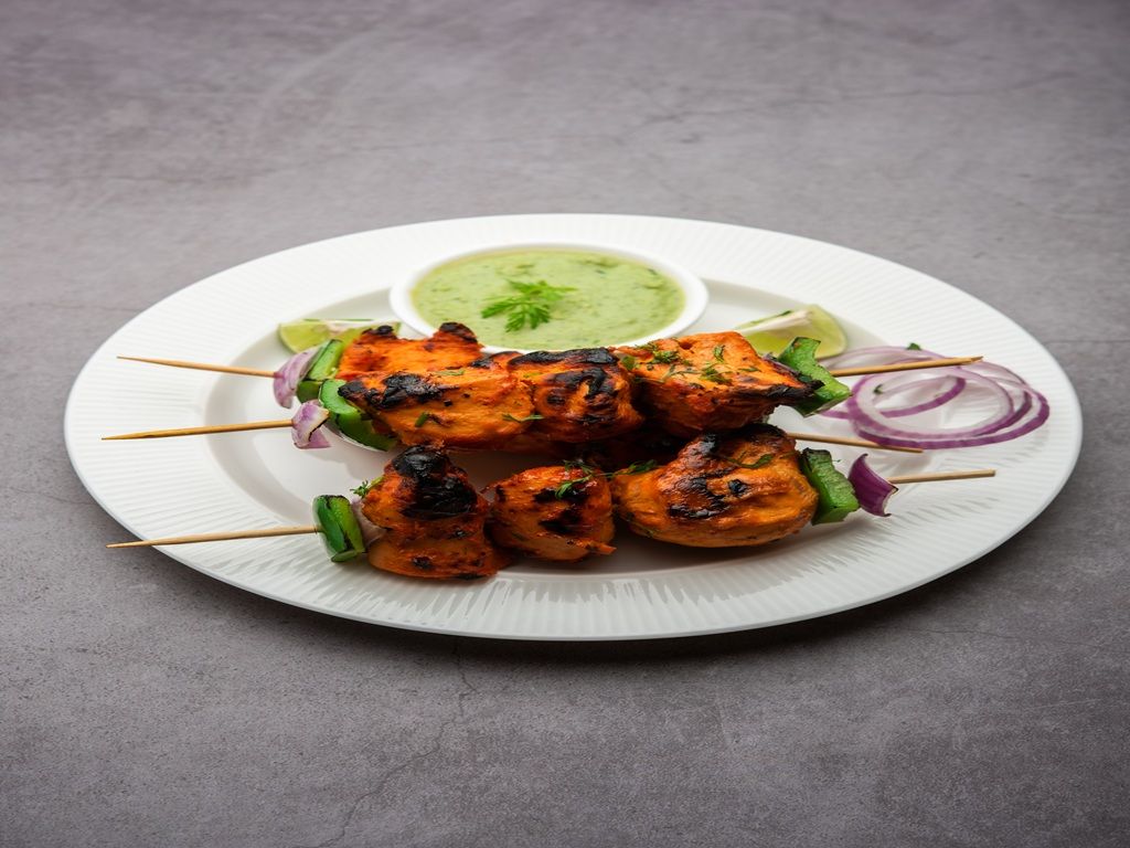 CHICKEN TIKKA AND LAMB SEEKH KEBAB.
