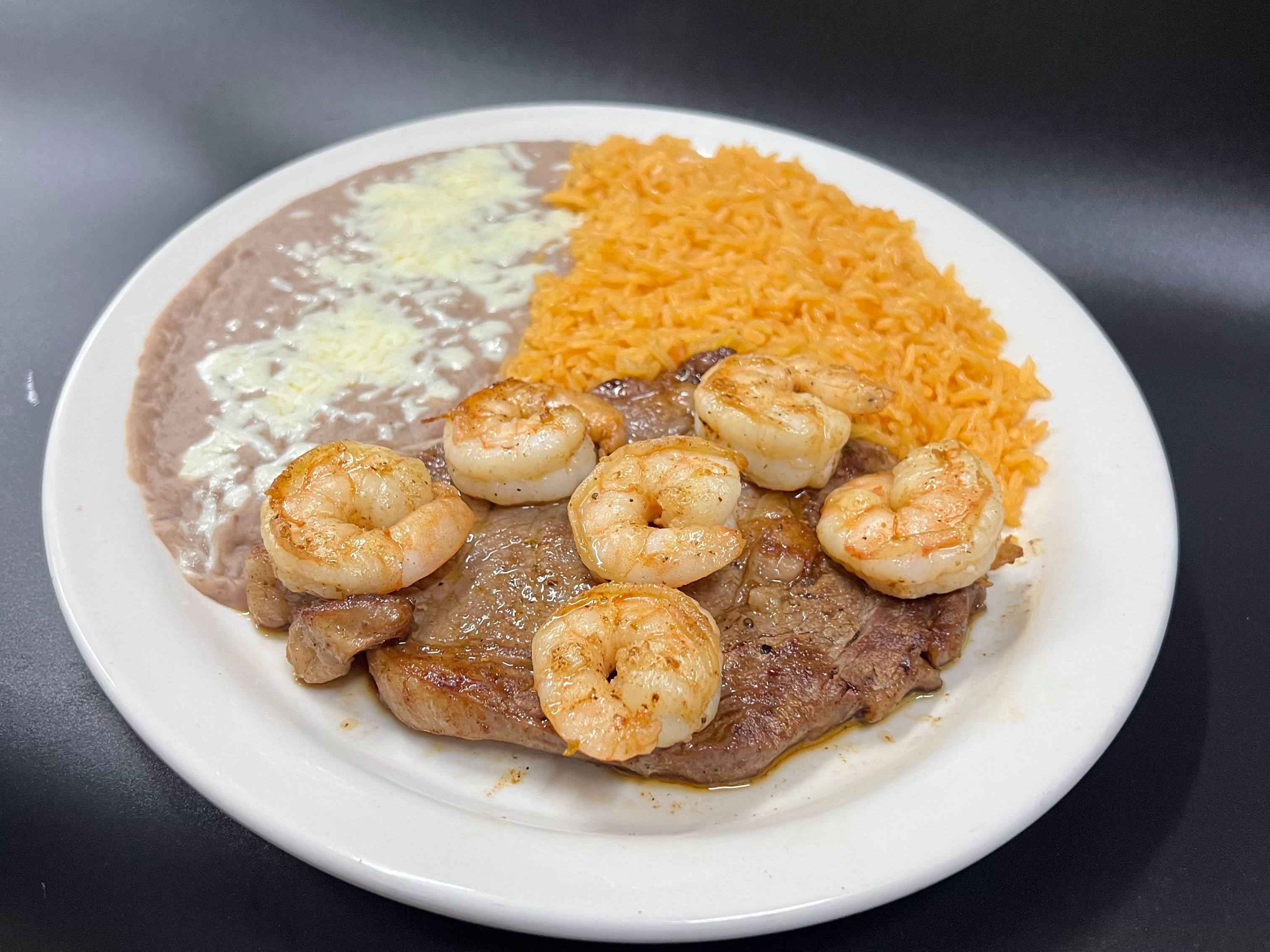 Steak con Camarones.