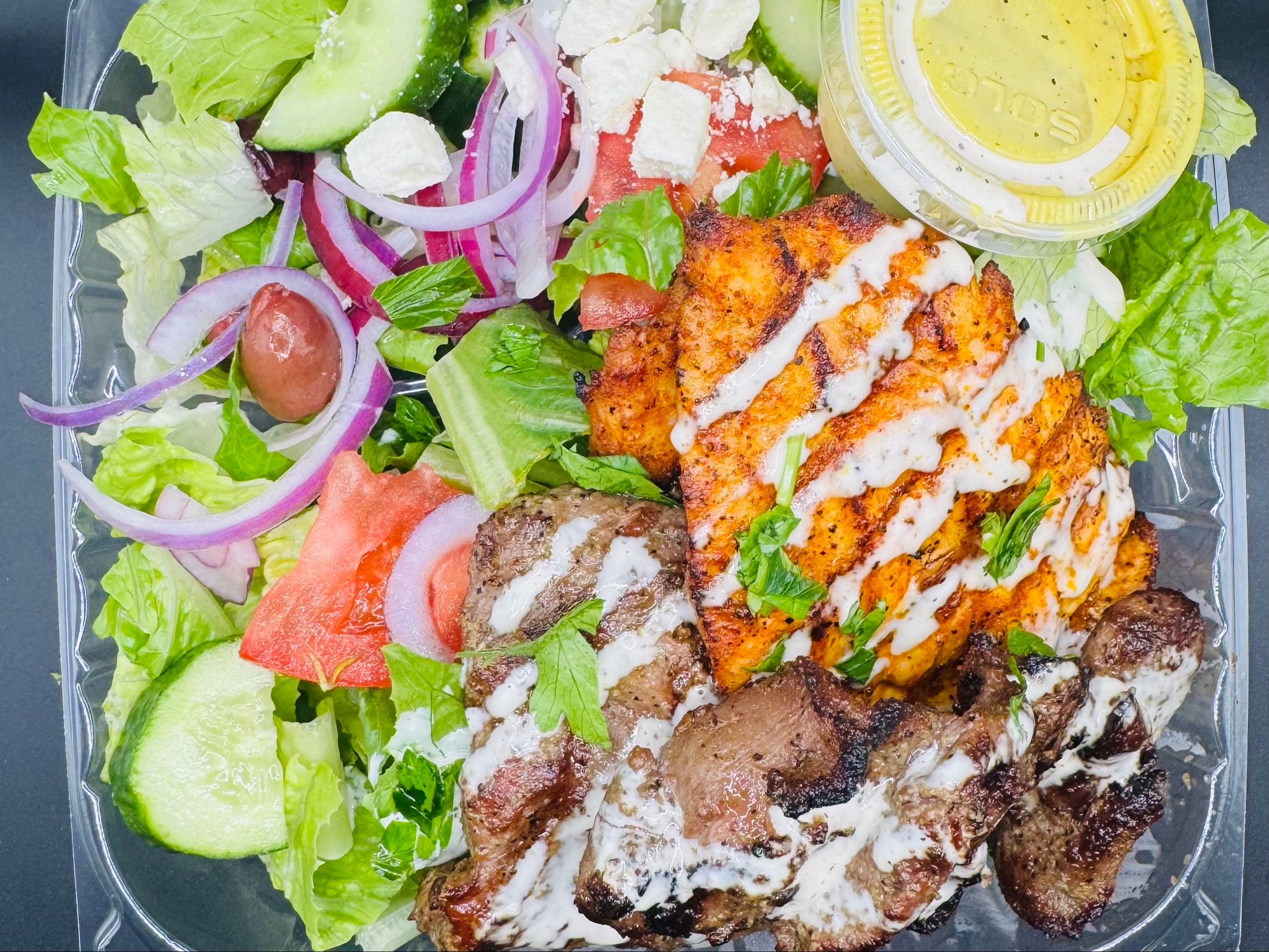 Lamb And Chicken Kabob Salad.