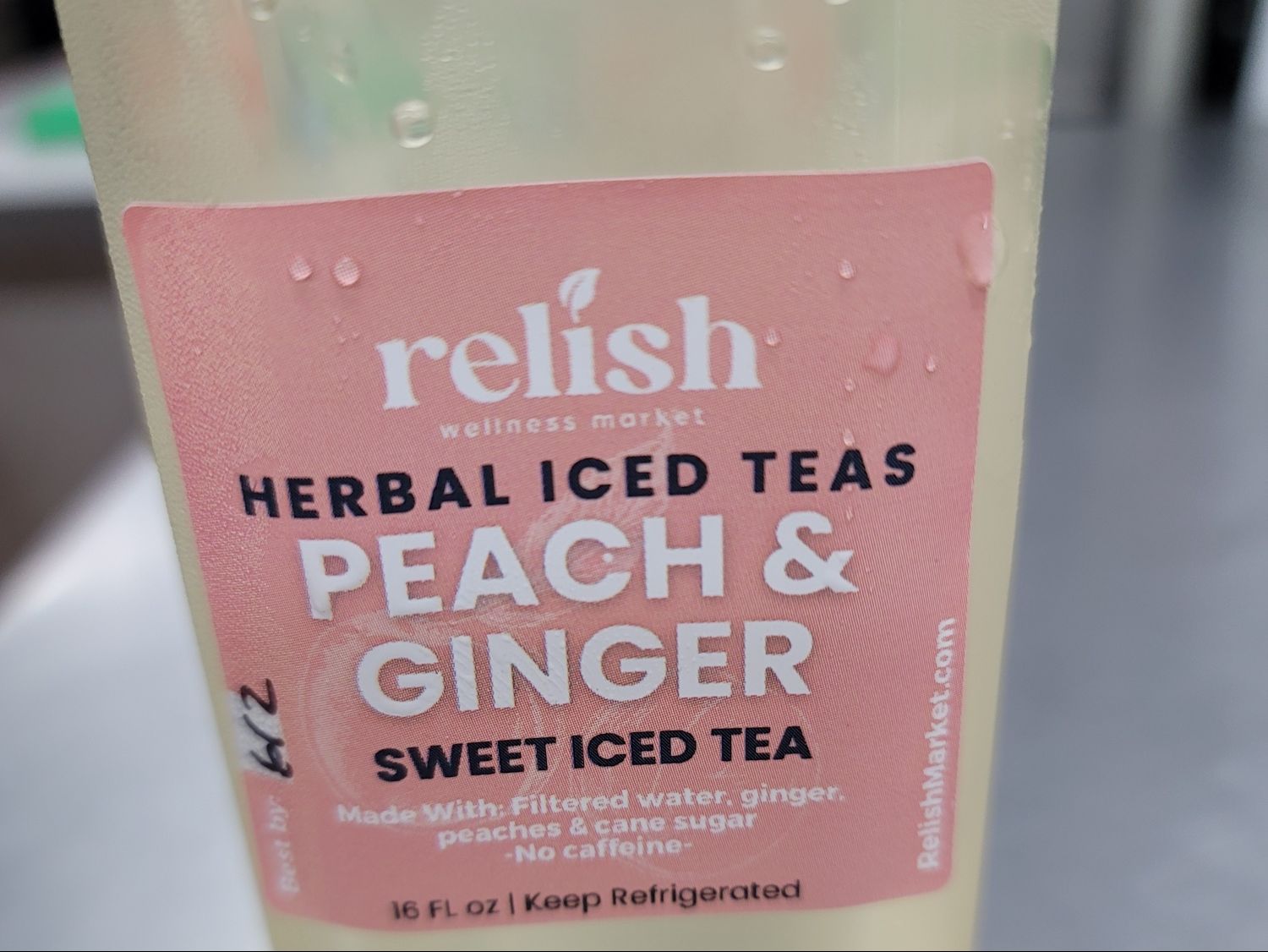 Herbal Peach & Ginger Sweet Iced Tea by Relish Wellness Market.
