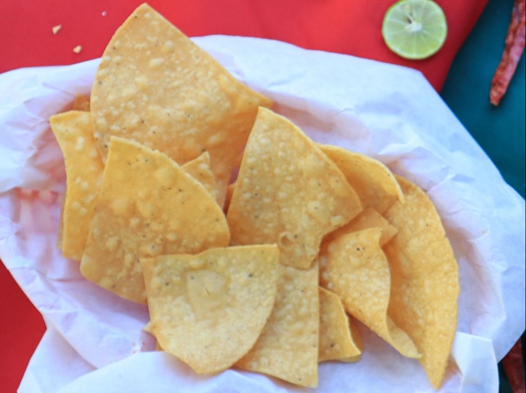 2oz Salsa And Small Chips.