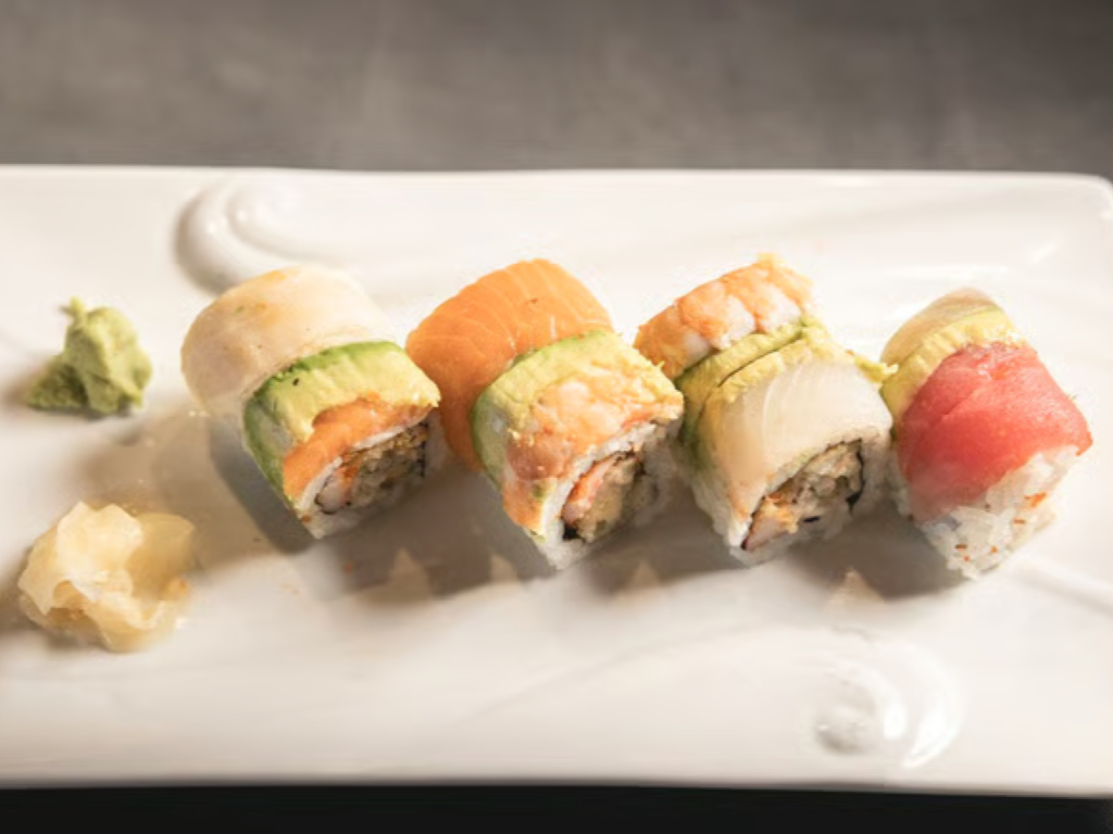 SR7. Sea in Japan Roll - Fried oyster, crab stick & fish egg, inside, assorted slices of fish on top.