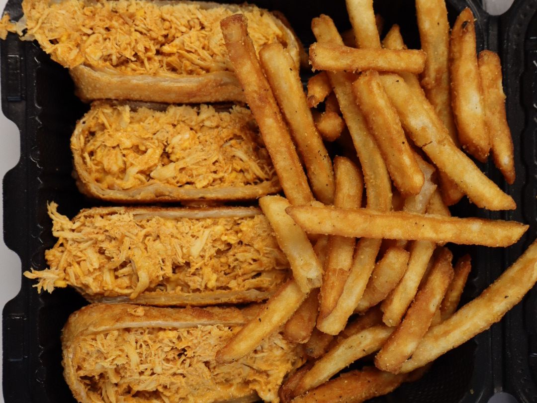 Buffalo chicken egg rolls w/fries