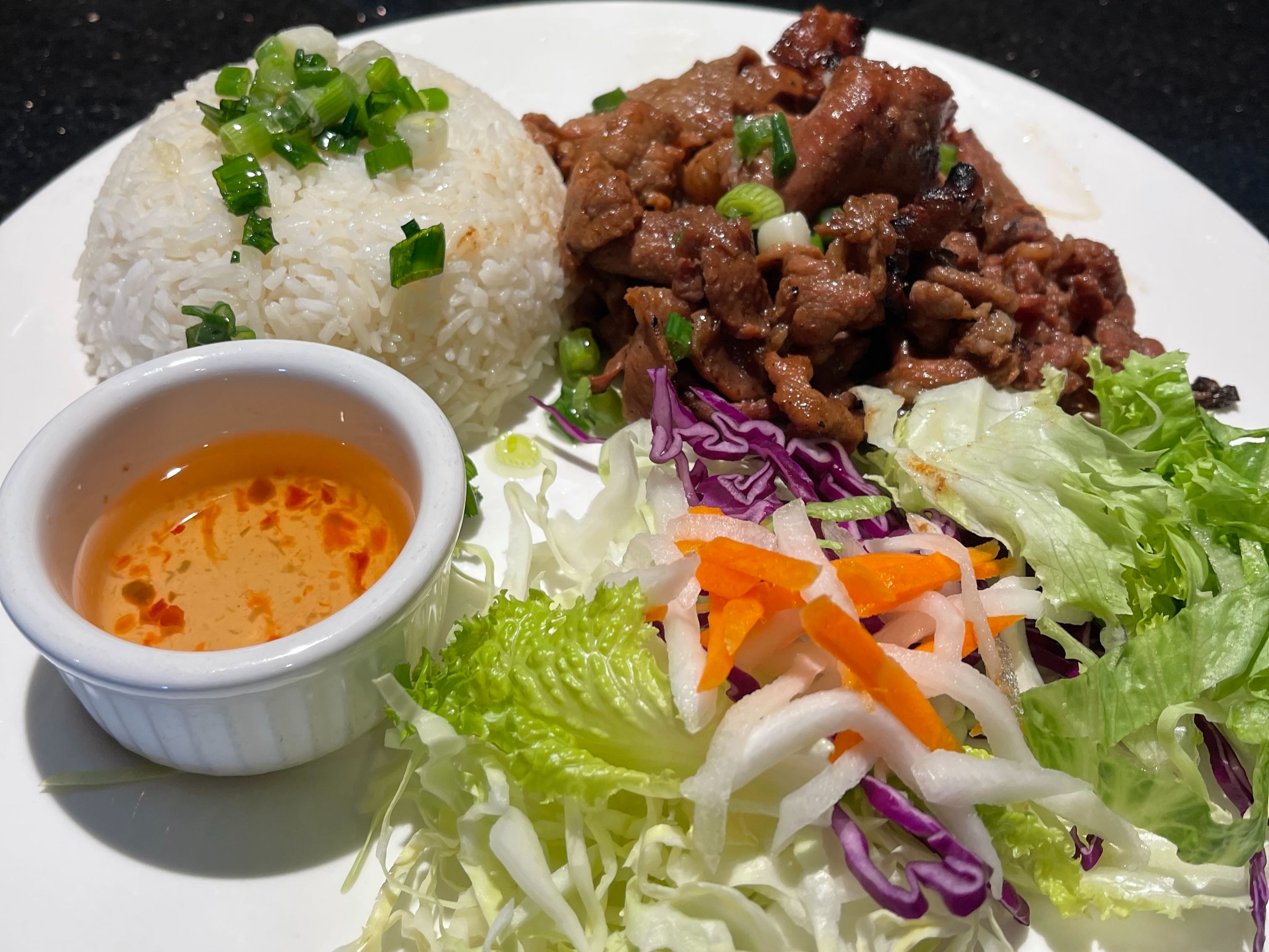 33. Cơm Thịt Nướng / Steamed Rice w/Grilled Pork Strip.