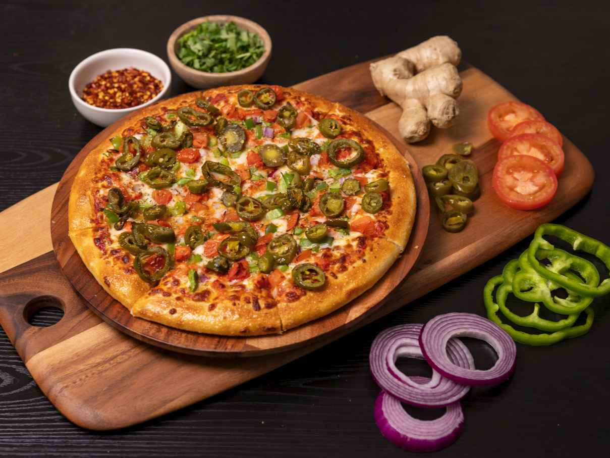 Butter Paneer Masala Pizza.
