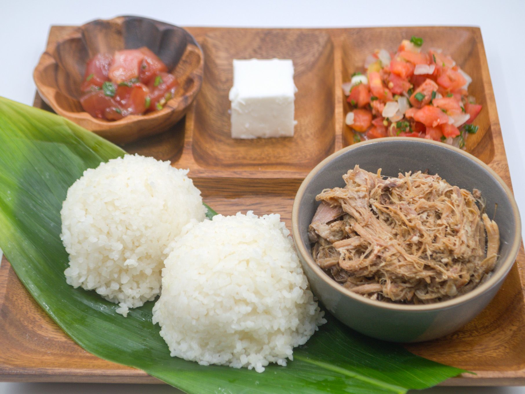 #6 Kalua Pig, Lomi, Poke & Haupia from Yama's Fish Market — Kalua pig, lomi salmon, your choice of poke, white rice, and haupia for dessert.