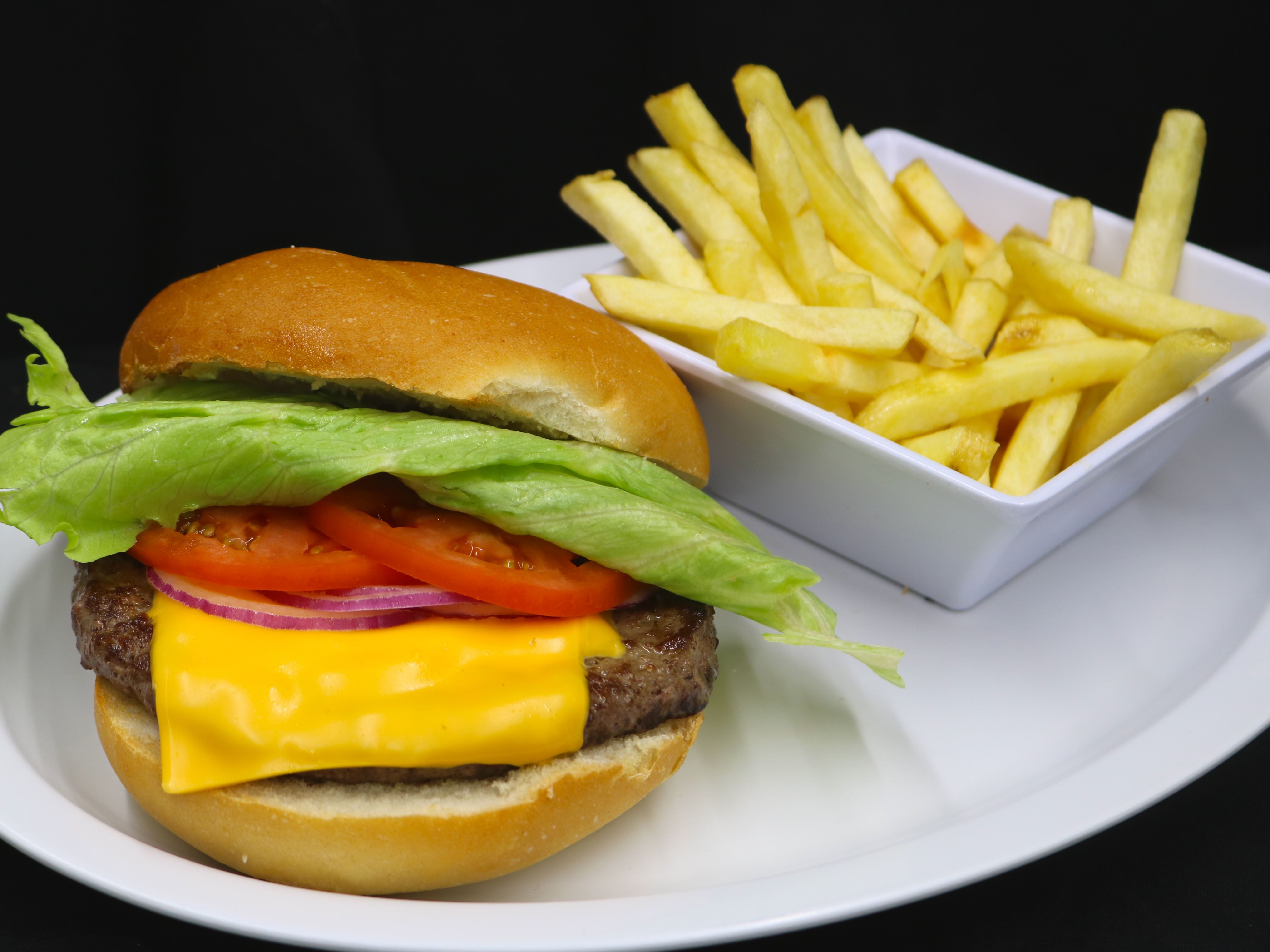 Cheeseburger Deluxe w/ French Fries.