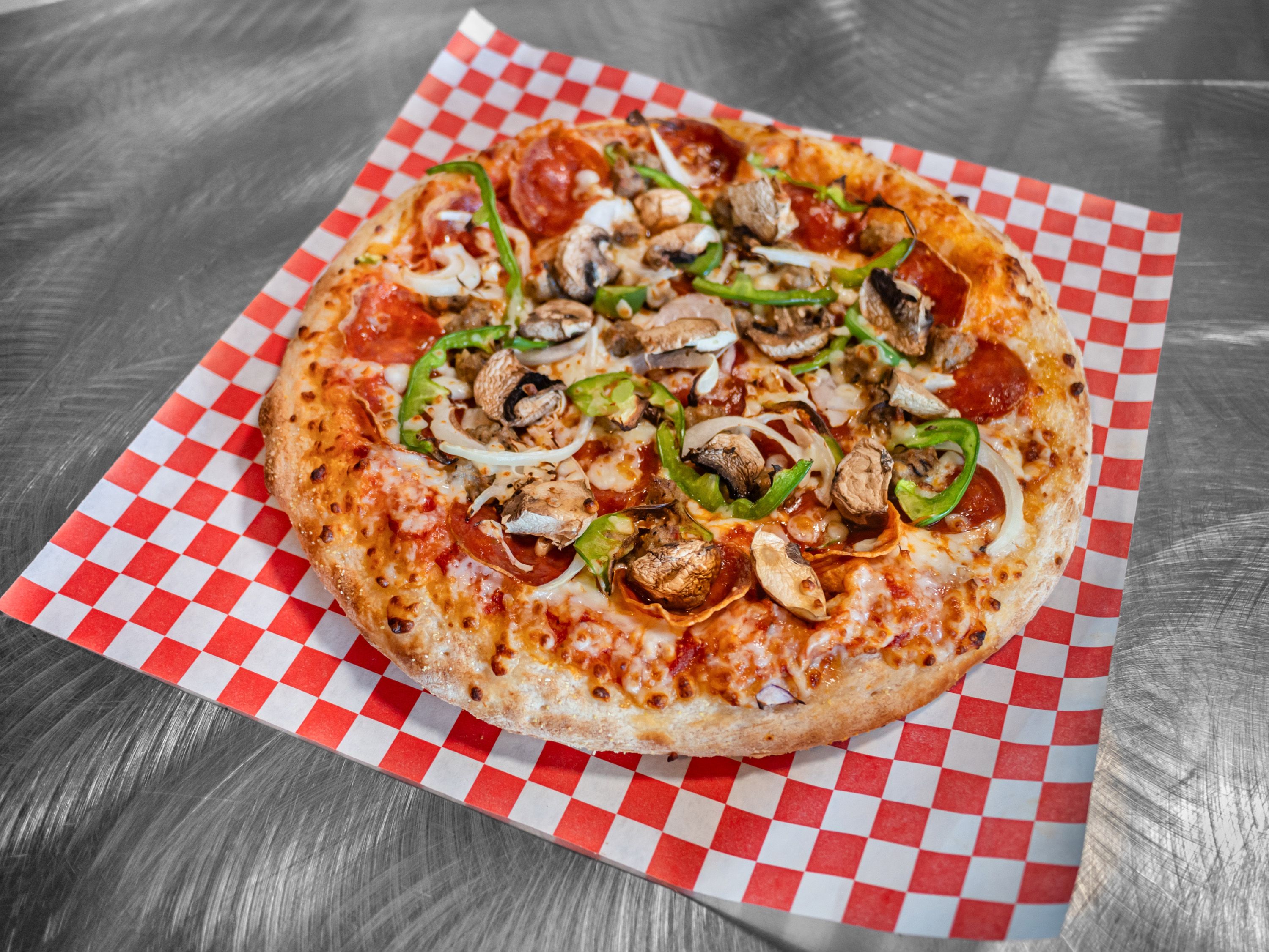 12" Deluxe Pizza.