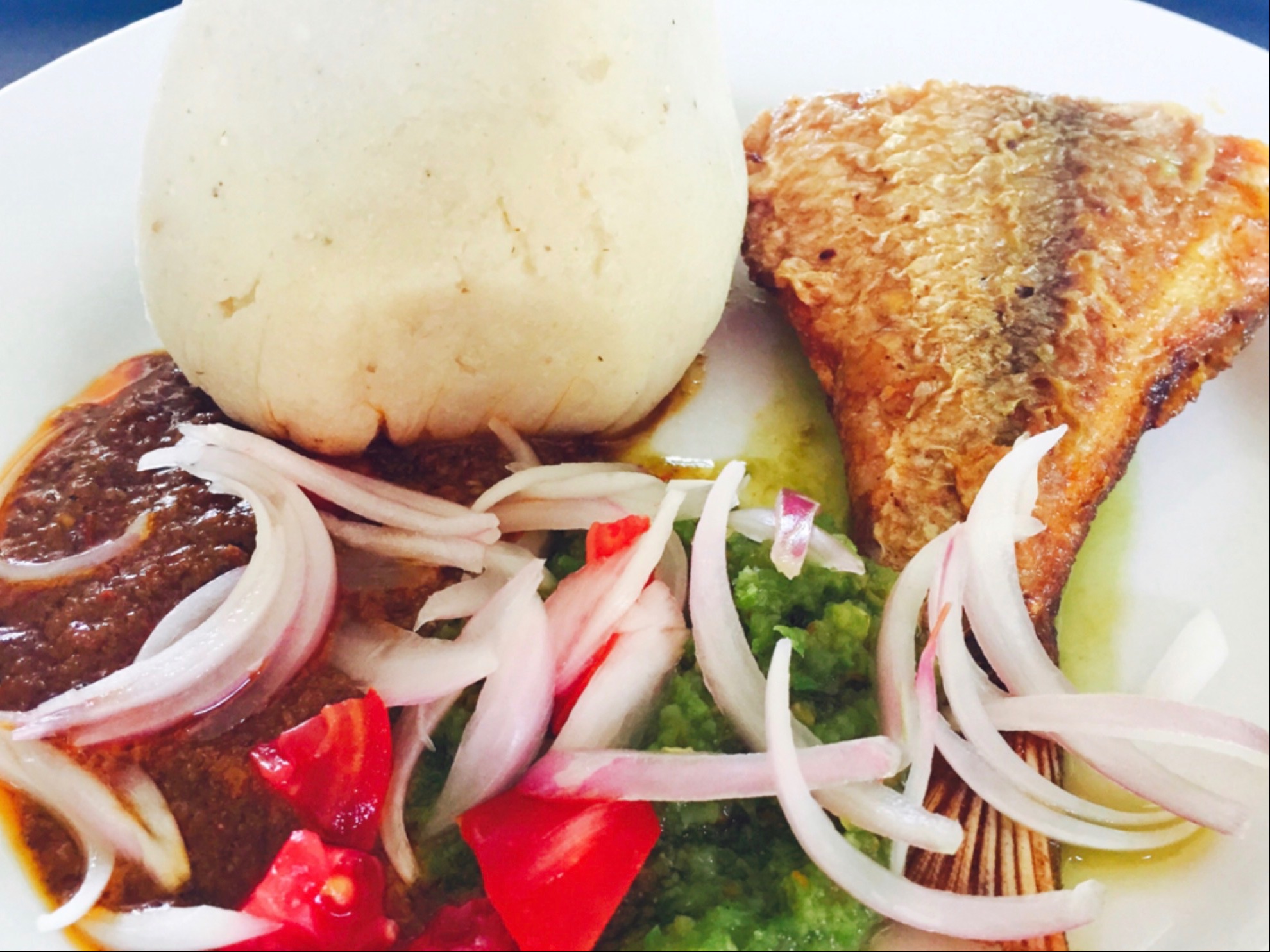 Banku And Blended Pepper with Fish.