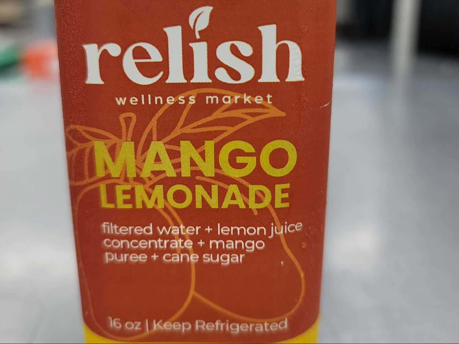 Fresh Mango Lemonade by Relish Wellness Market.