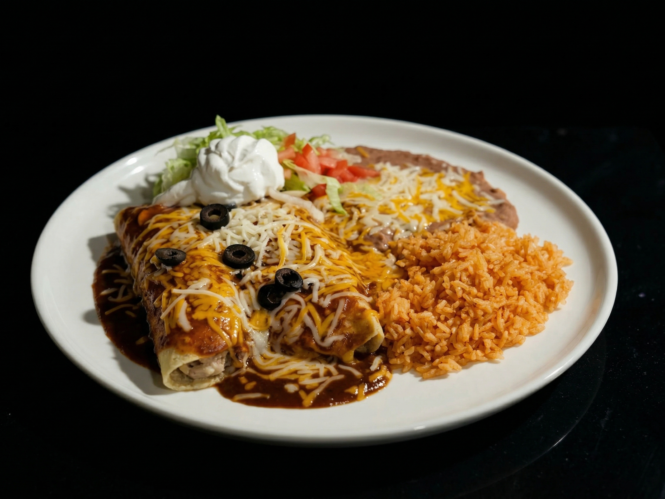 Chicken Enchilada w/ rice or beans (E)
