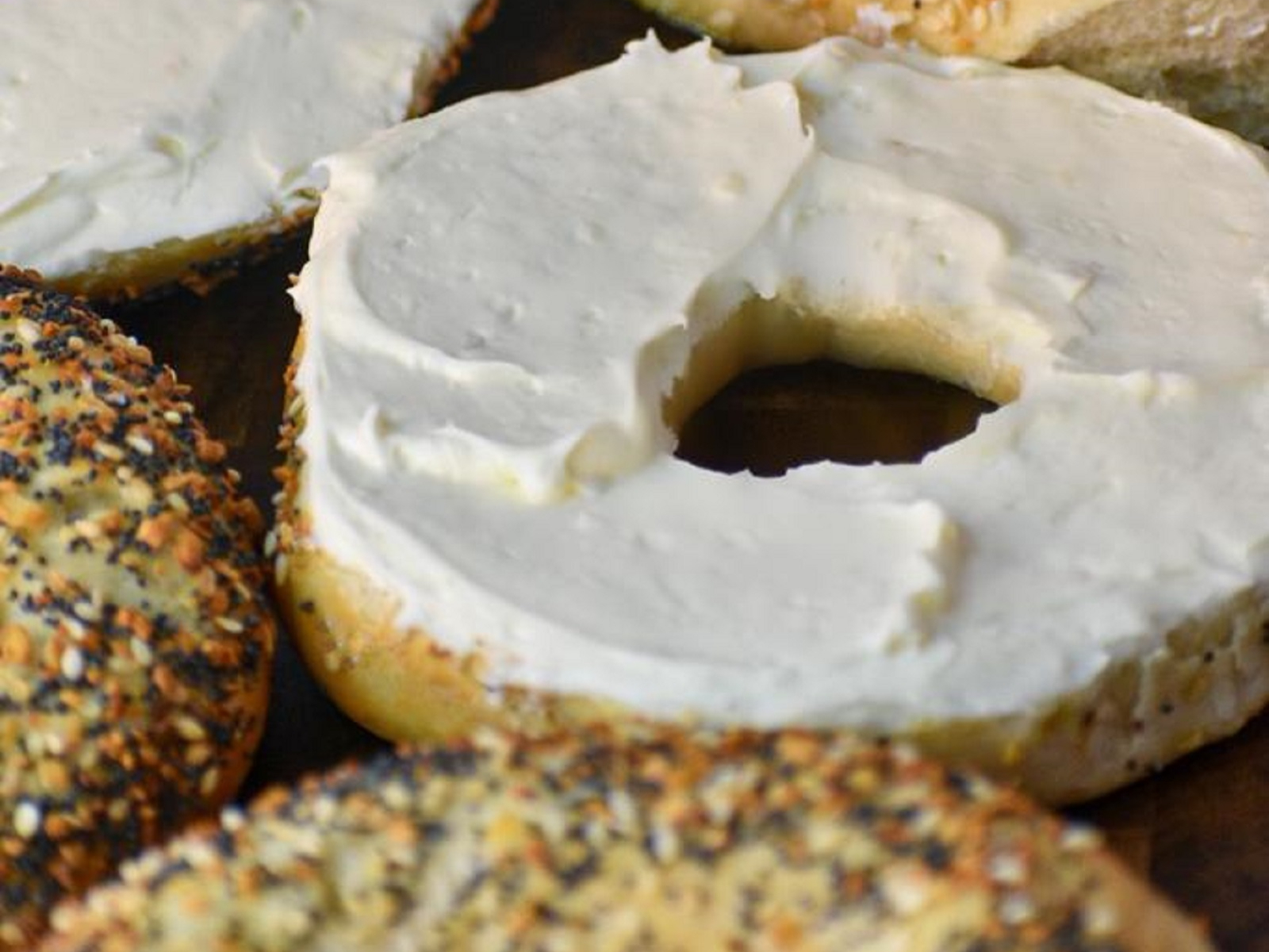 BAGEL W/ CREAM CHEESE & BUTTER (both sides).