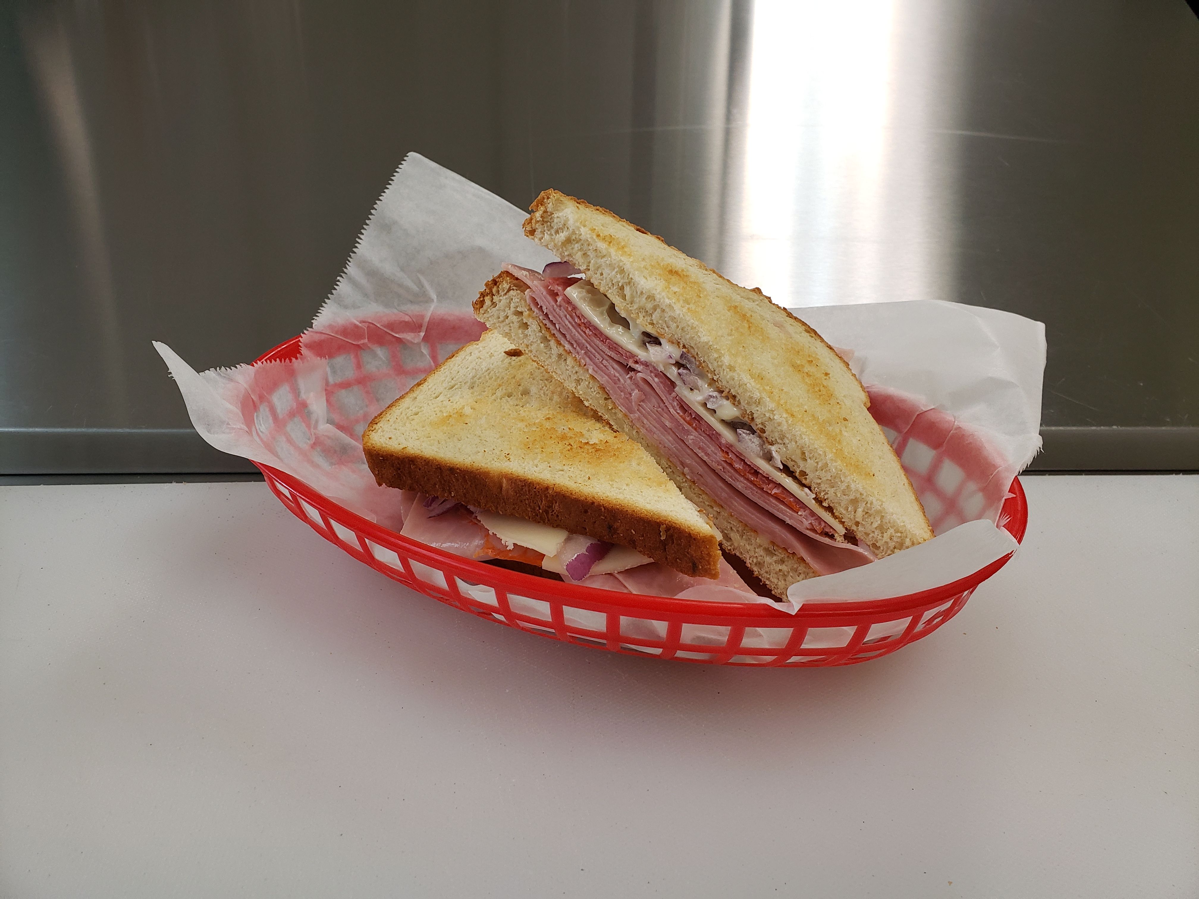 Simple Sandwich W\chips And Pickle Spear.