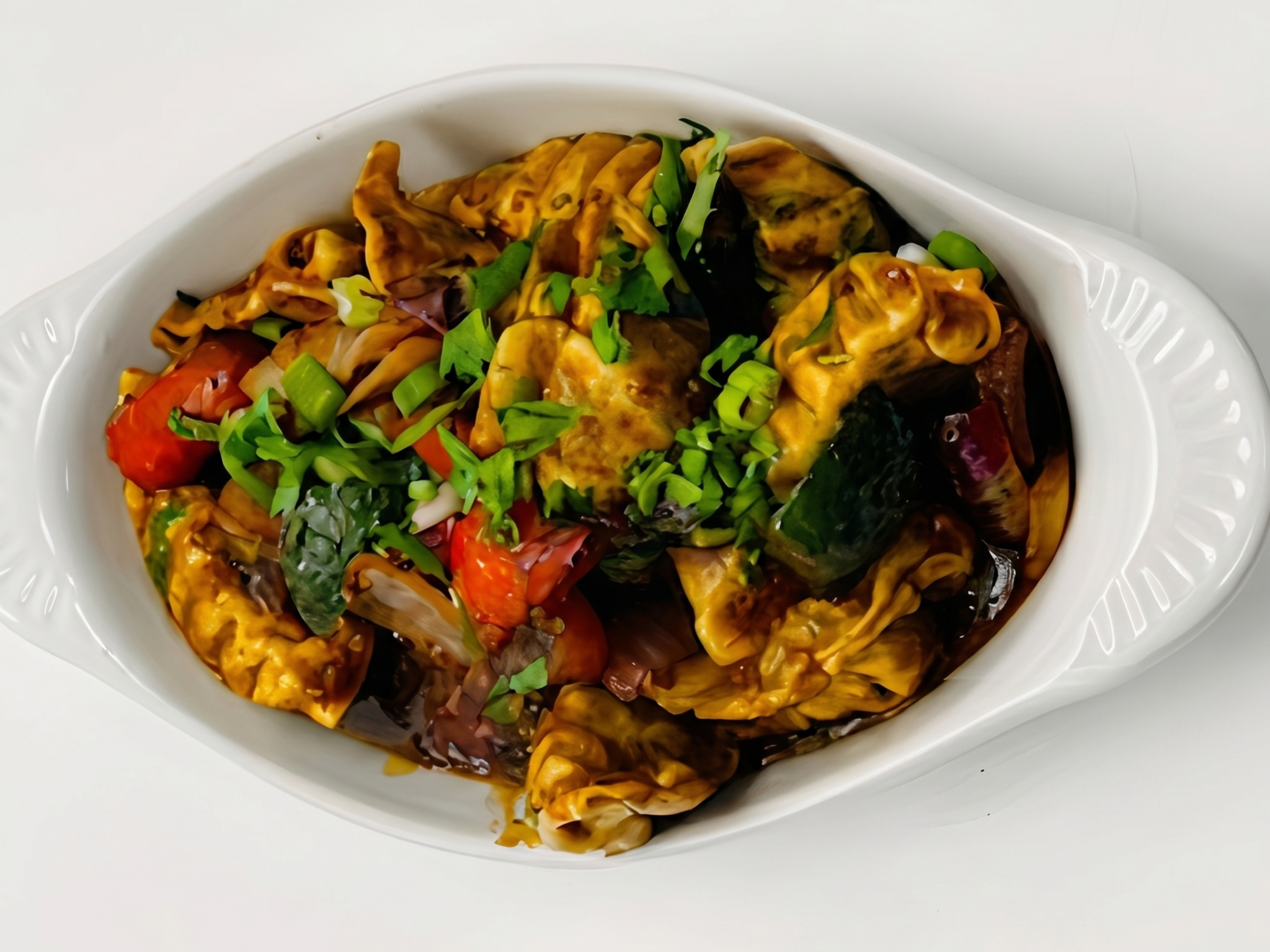 Manchurian Chicken Momos (10 Pcs).