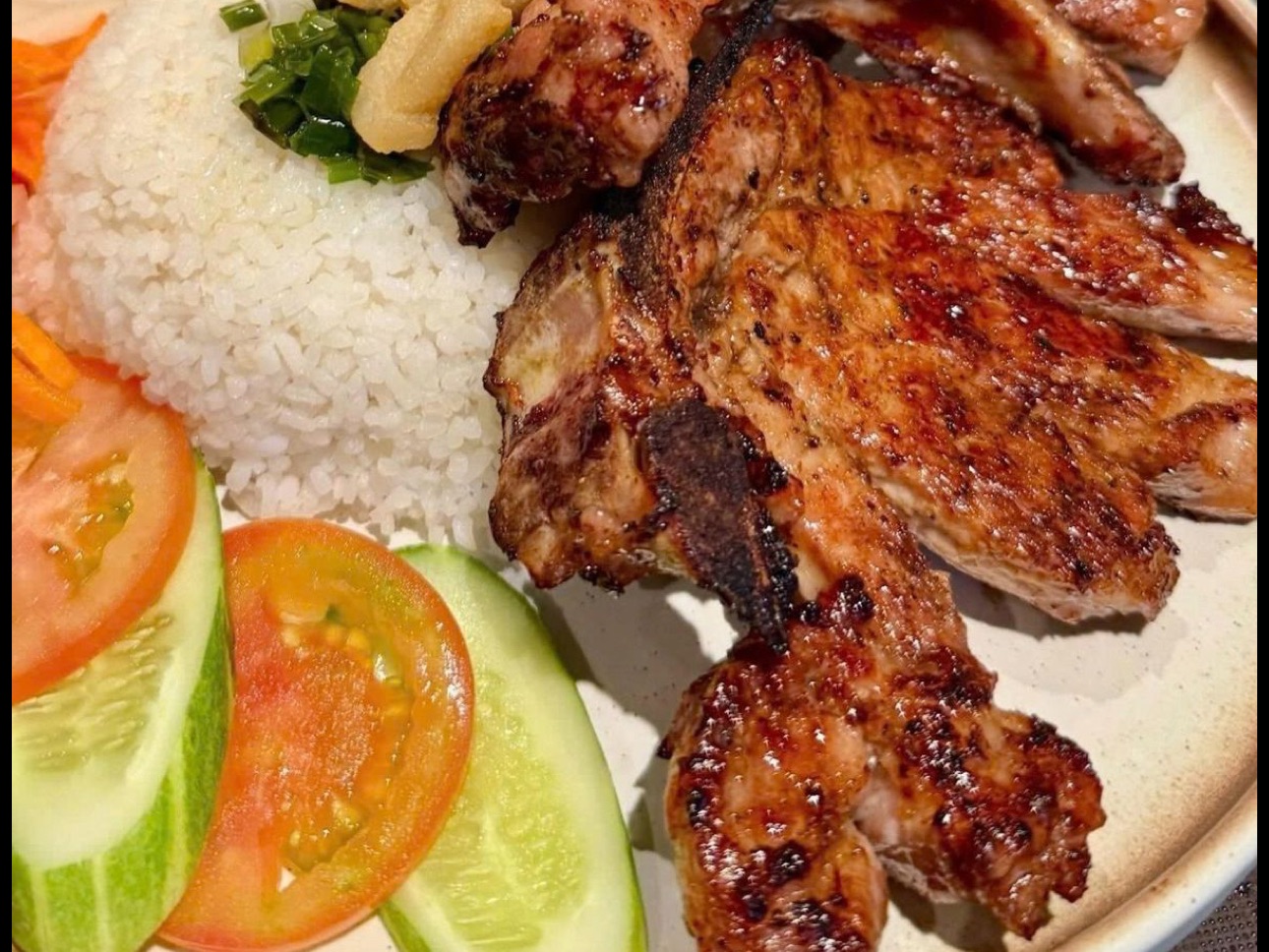 27 Broken Rice with Grilled Pork Chop & Egg Meatloaf.