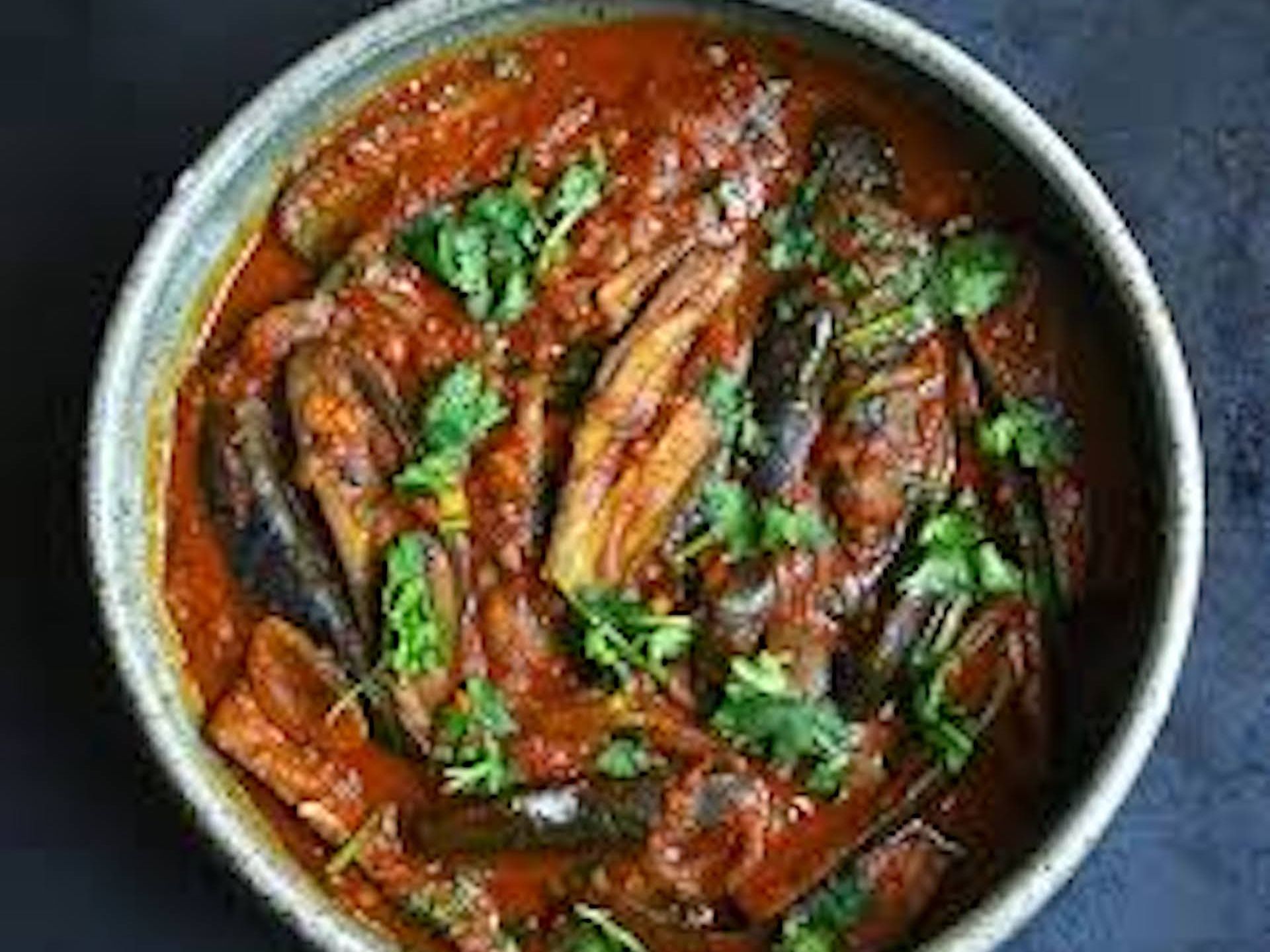 HOT & SOUR EGG PLANT CURRY.