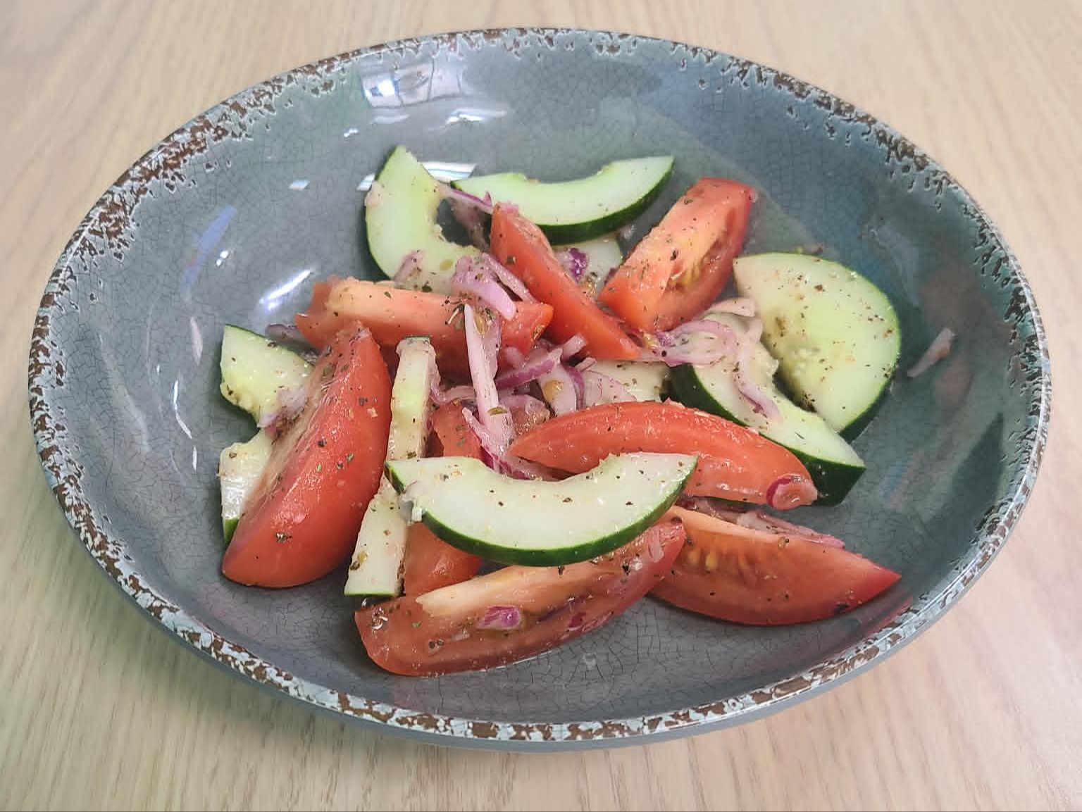 Tomato, Cucumber, & Onion Salad Half Salad Plate.