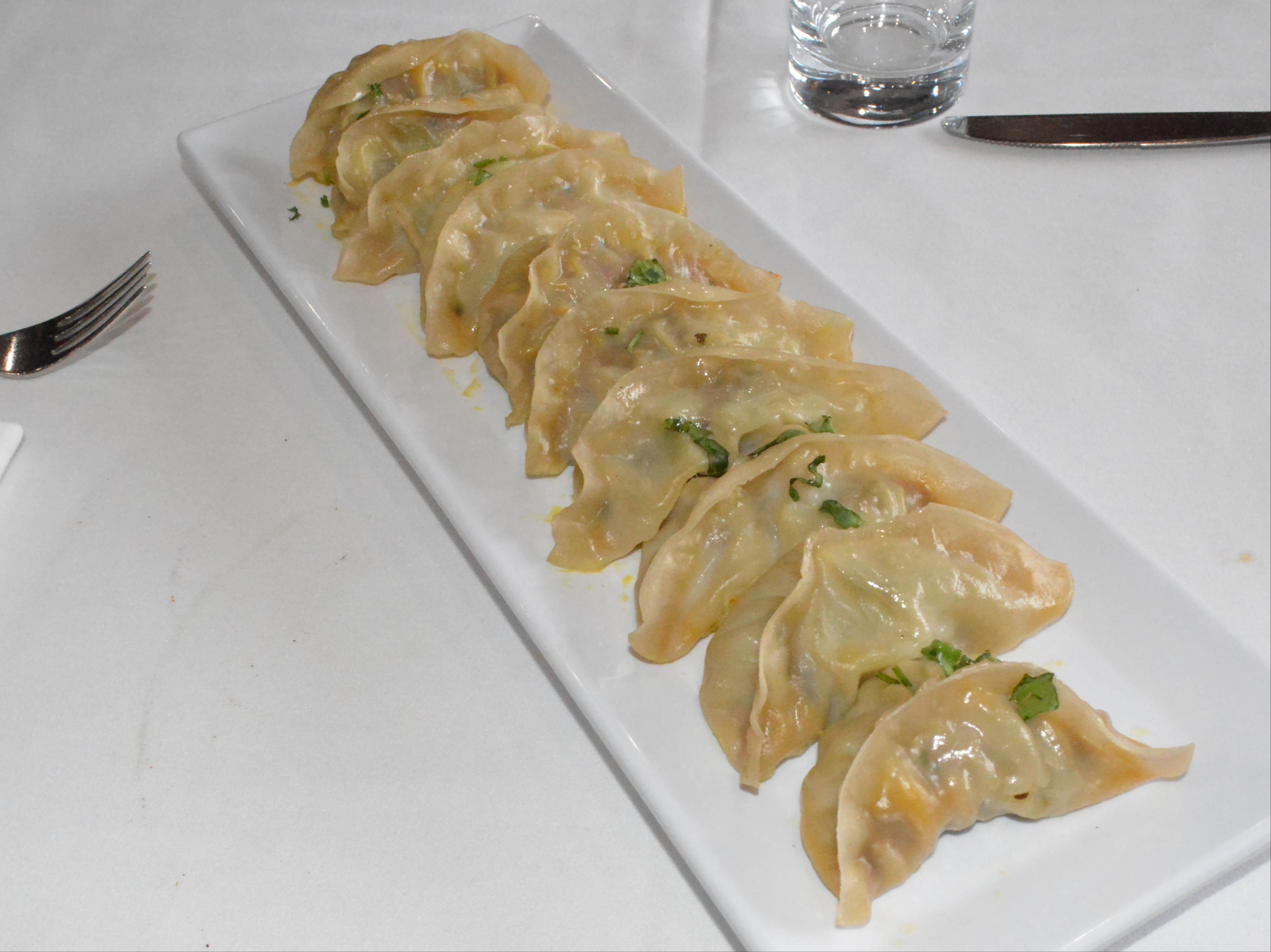 STEAMED CHICKEN MOMO.