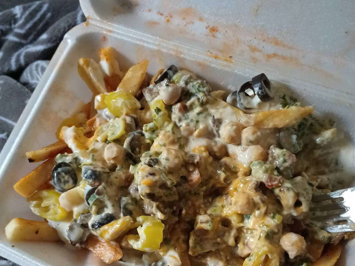 CUP OF NACHO CHEESE.