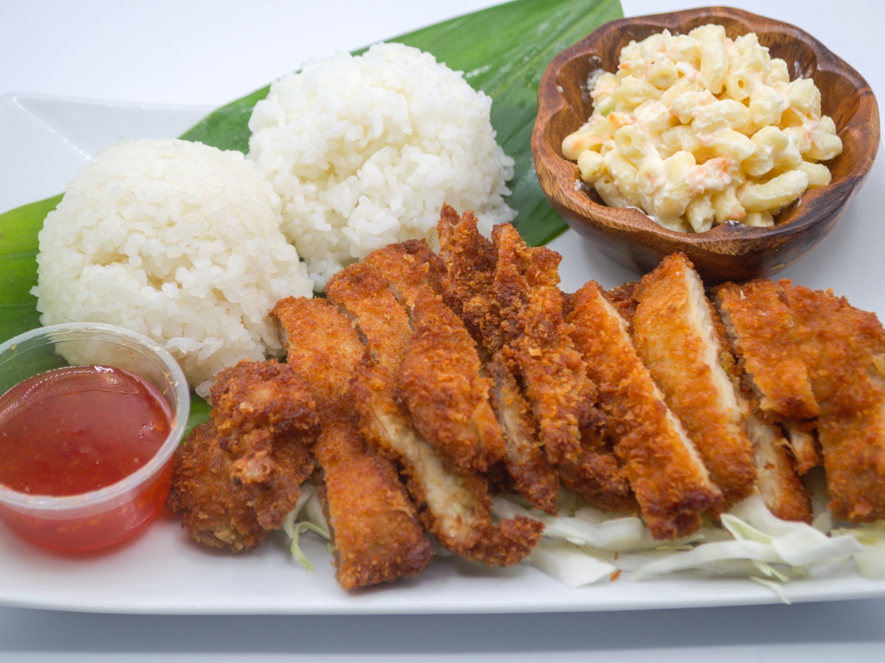 #16 Mochiko Chicken from Yama's Fish Market — A local favorite — bite-sized chicken marinated in mochiko batter, fried crisp, and ono! Served with white rice and mac salad.