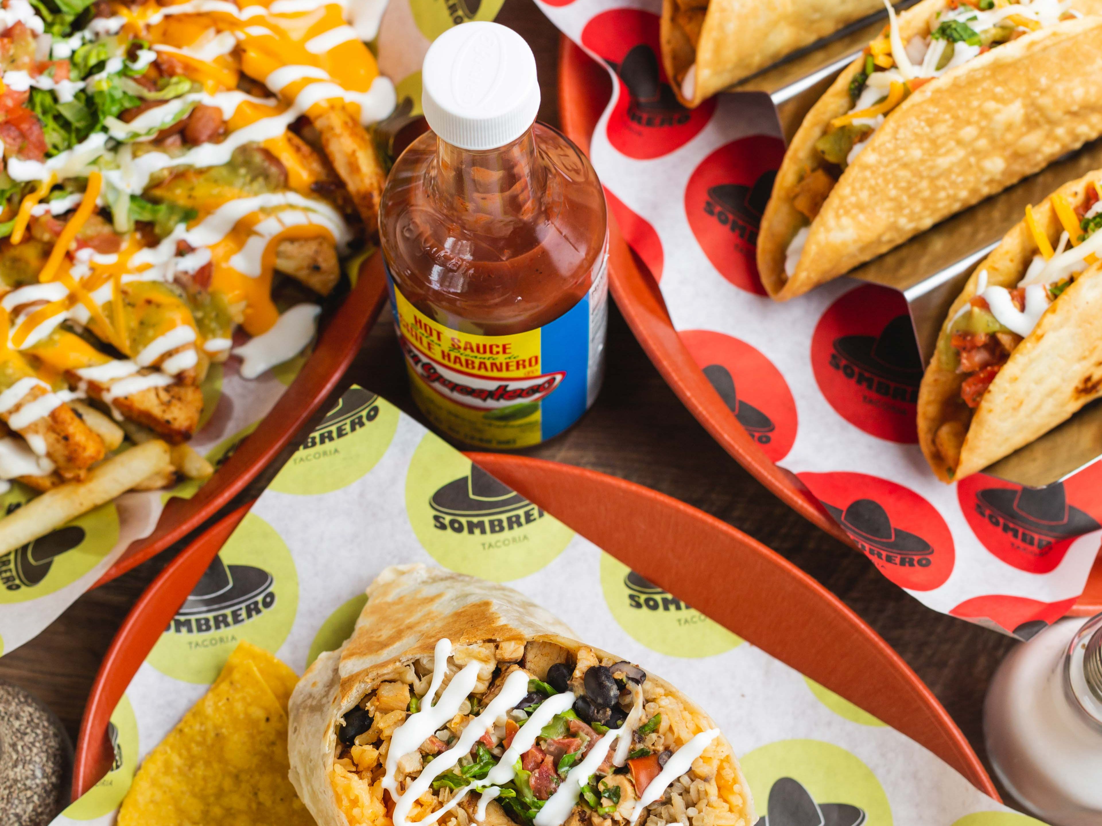 Familia Platter (10 Chicken, 10 Steak Tacos, 3 Quesadillas (Chicken, Steak & Cheese) Sides of Rice and Beans, Chips and Guac).