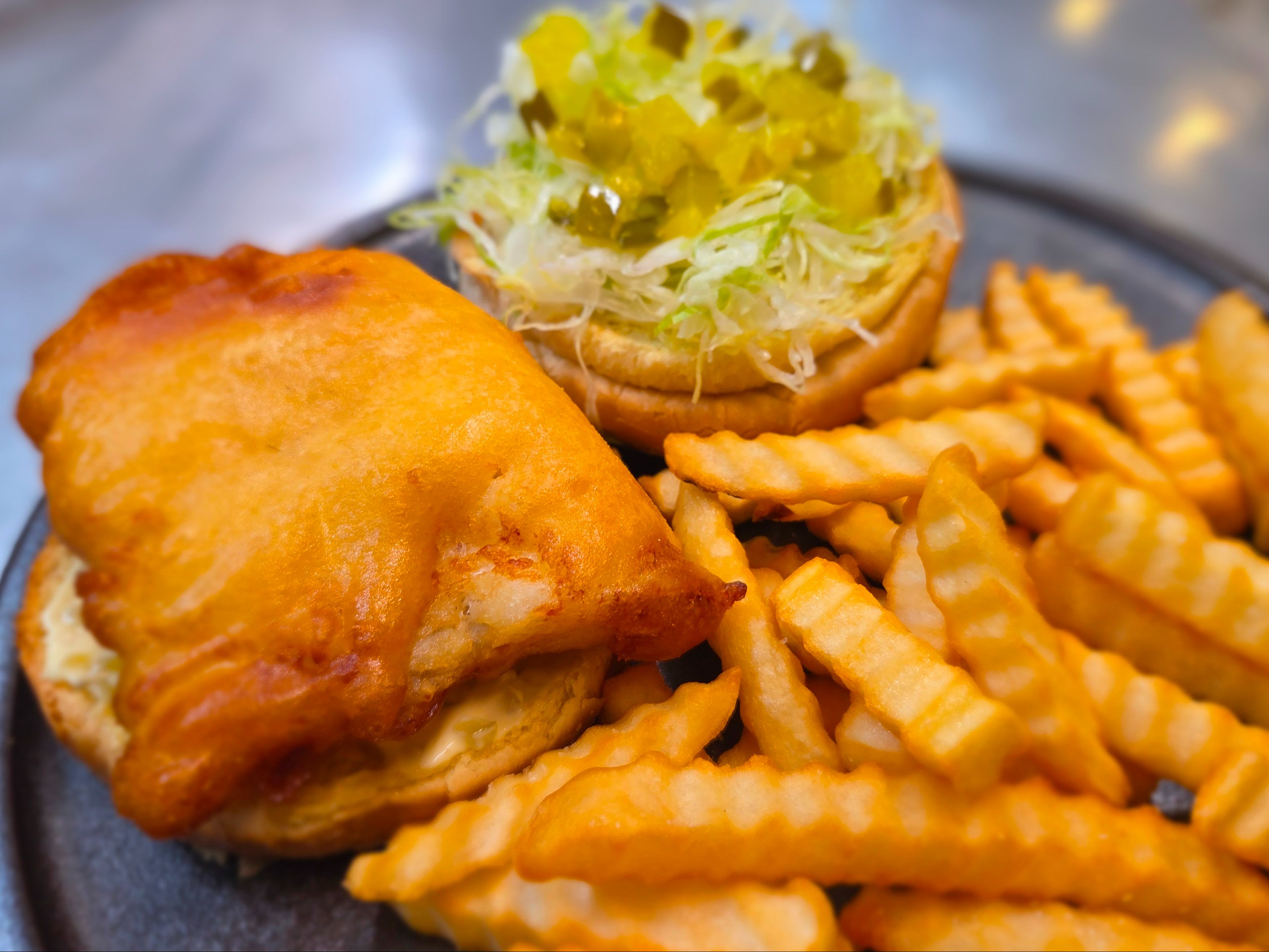 Haddock Sandwich With Fries.