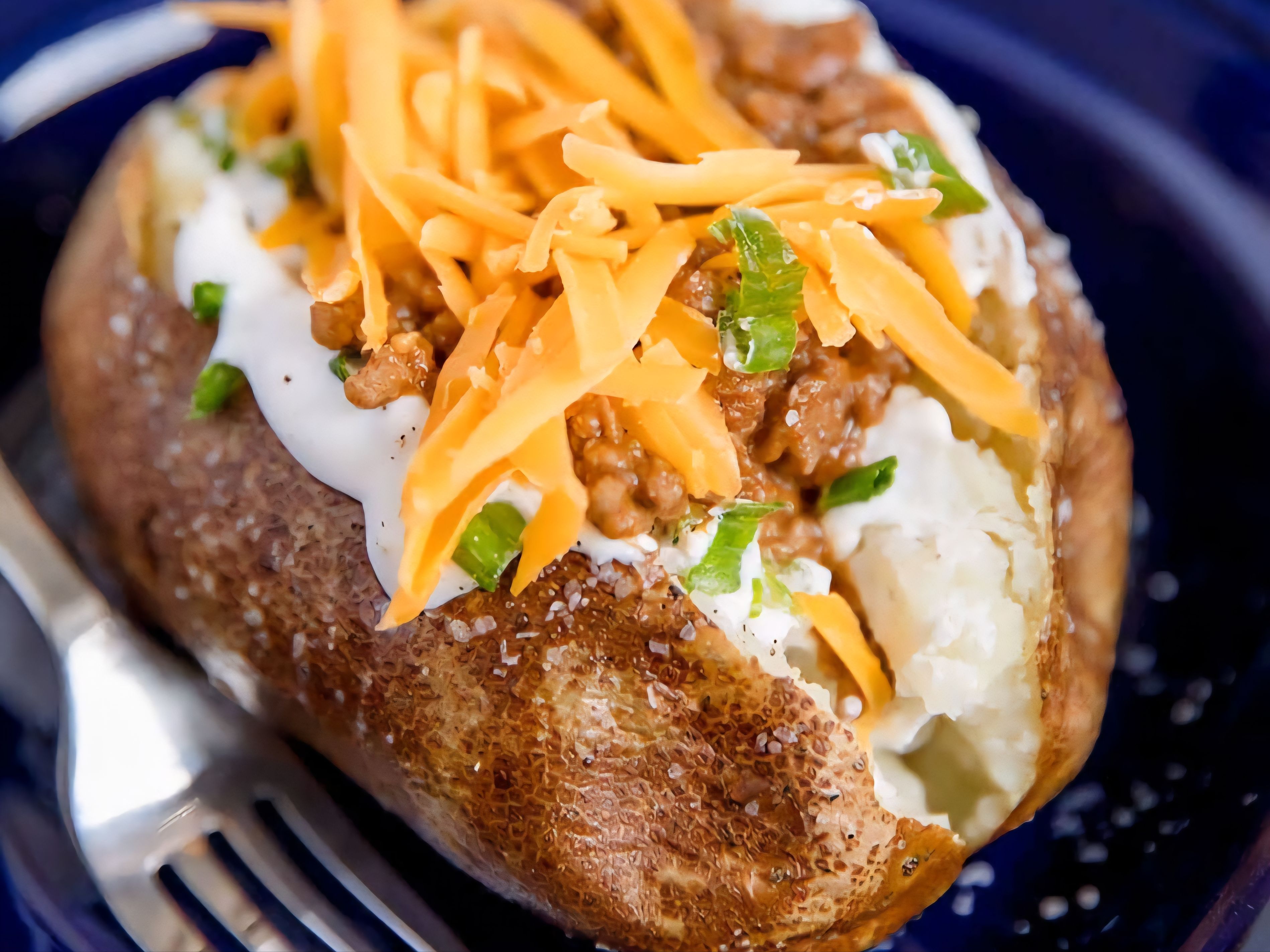 STEAK & CHEESE POTATO.