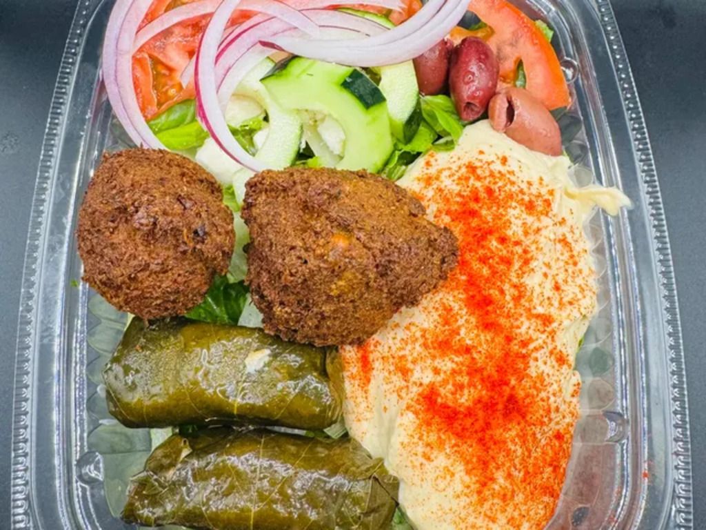 HUMMUS, FALAFELS, GRAPE LEAVES SALAD BOWL.