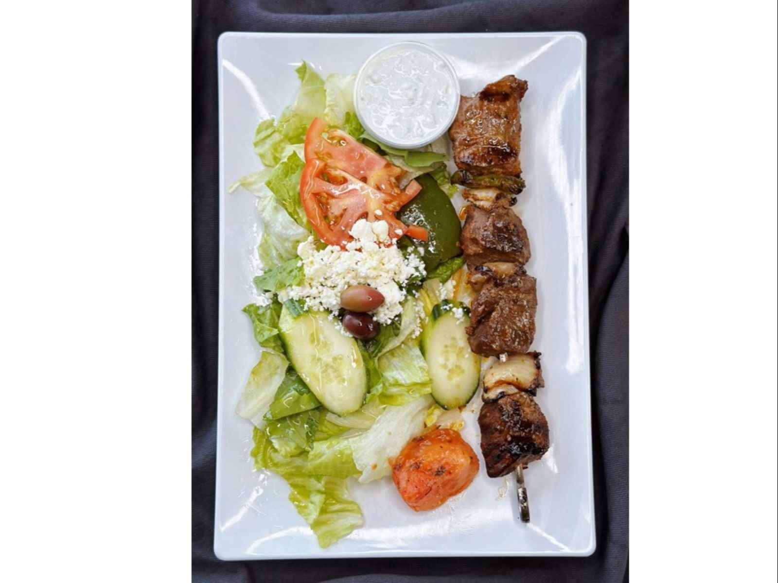 Lamb Shish (1 Skewer) Over Salad.