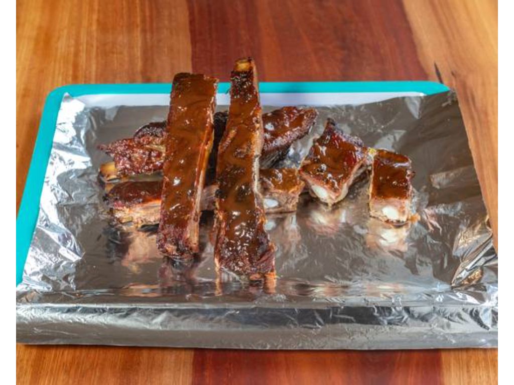 HALF PORK SPARERIB RACK + 2 SIDES.