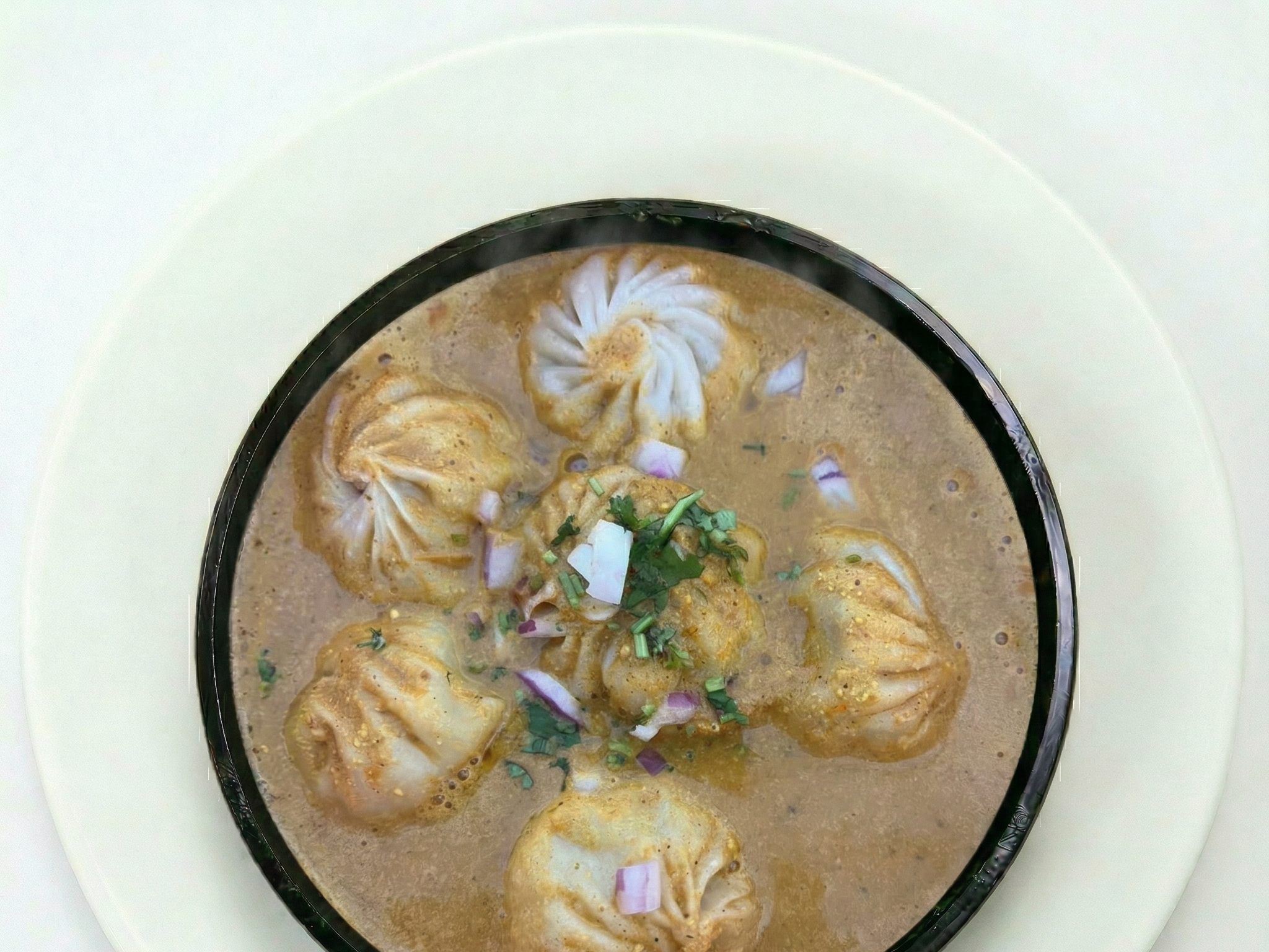 Pork Jhol Momo.